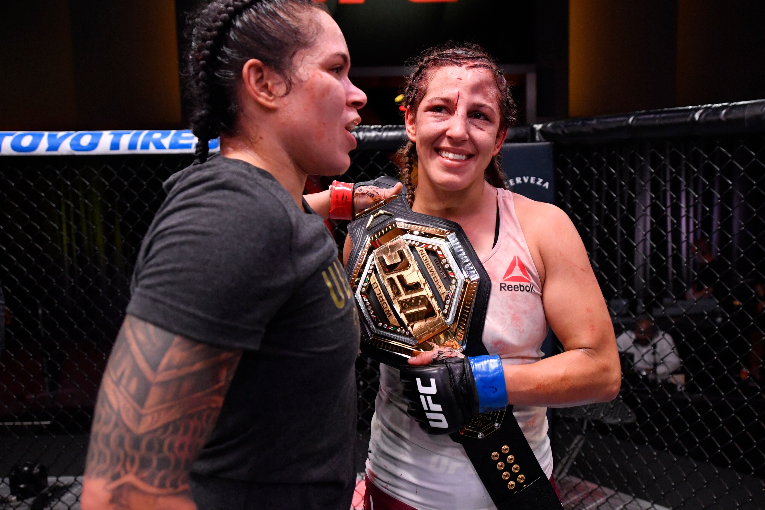 LAS VEGAS, NEVADA - JUNE 06: (L-R) Amanda Nunes of Brazil and Felicia Spencer of Canada talk after their UFC featherweight championship bout during the UFC 250 event at UFC APEX on June 06, 2020 in Las Vegas, Nevada. (Photo by Jeff Bottari/Zuffa LLC)