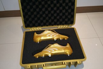 The gold Adidas Predators once worn by Zinedine Zidane.