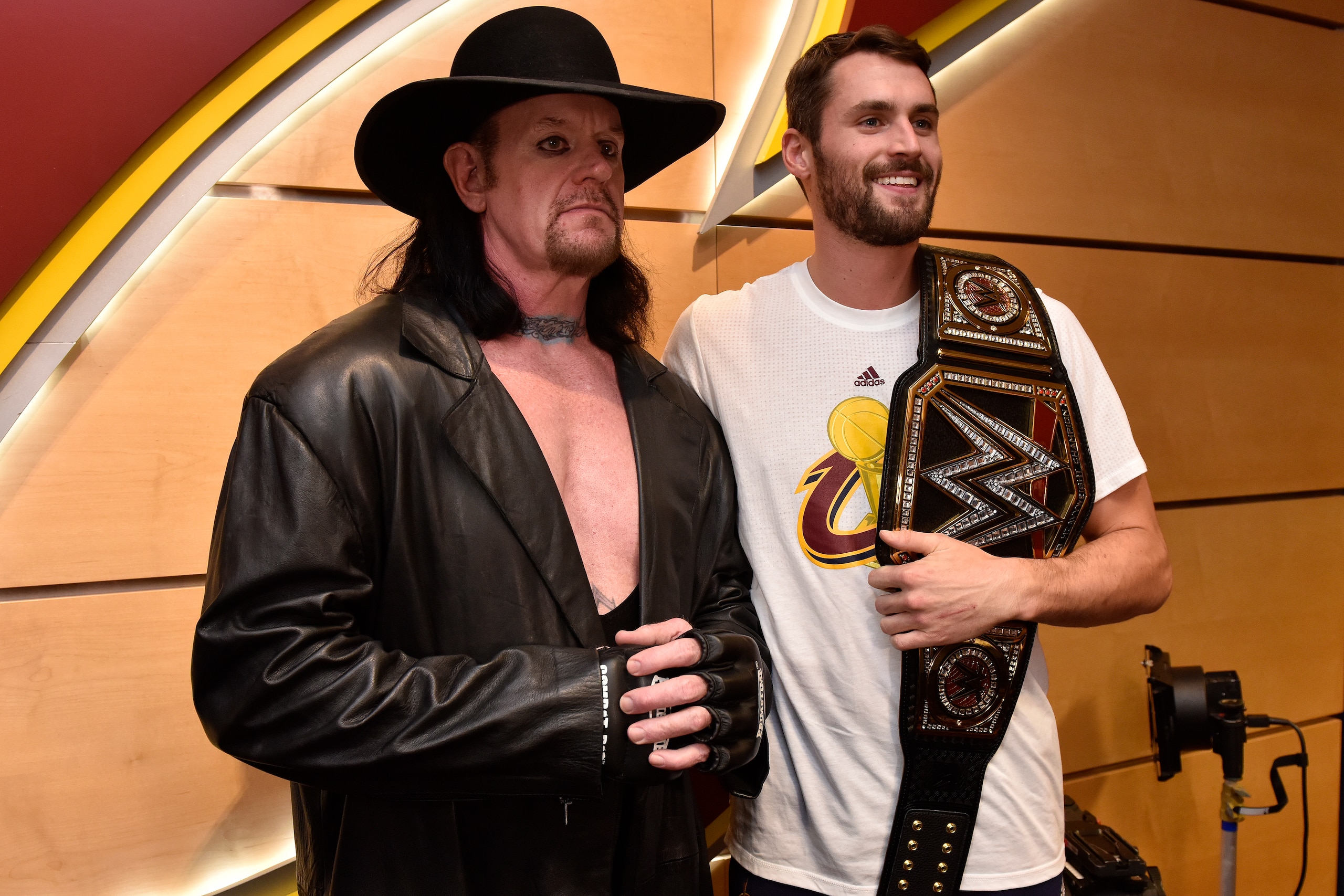 CLEVELAND, OH - OCTOBER 25: WWE Wrestler, The Undertaker poses for a photo with Kevin Love #0 of the Cleveland Cavaliers before the game against the New York Knicks on October 25, 2016 at Quicken Loans Arena in Cleveland, Ohio. NOTE TO USER: User express CLEVELAND, OH - OCTOBER 25: WWE Wrestler, The Undertaker poses for a photo with Kevin Love #0 of the Cleveland Cavaliers before the game against the New York Knicks on October 25, 2016 at Quicken Loans Arena in Cleveland, Ohio. NOTE TO USER: User express