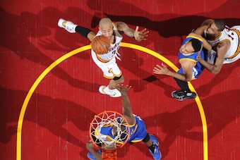 CLEVELAND, OH - JUNE 16:  Dahntay Jones #30 of the Cleveland Cavaliers drives to the basket against the Golden State Warriors during Game Six of the 2016 NBA Finals on June 16, 2016 at Quicken Loans Arena in Cleveland, Ohio. NOTE TO USER: User expressly a
