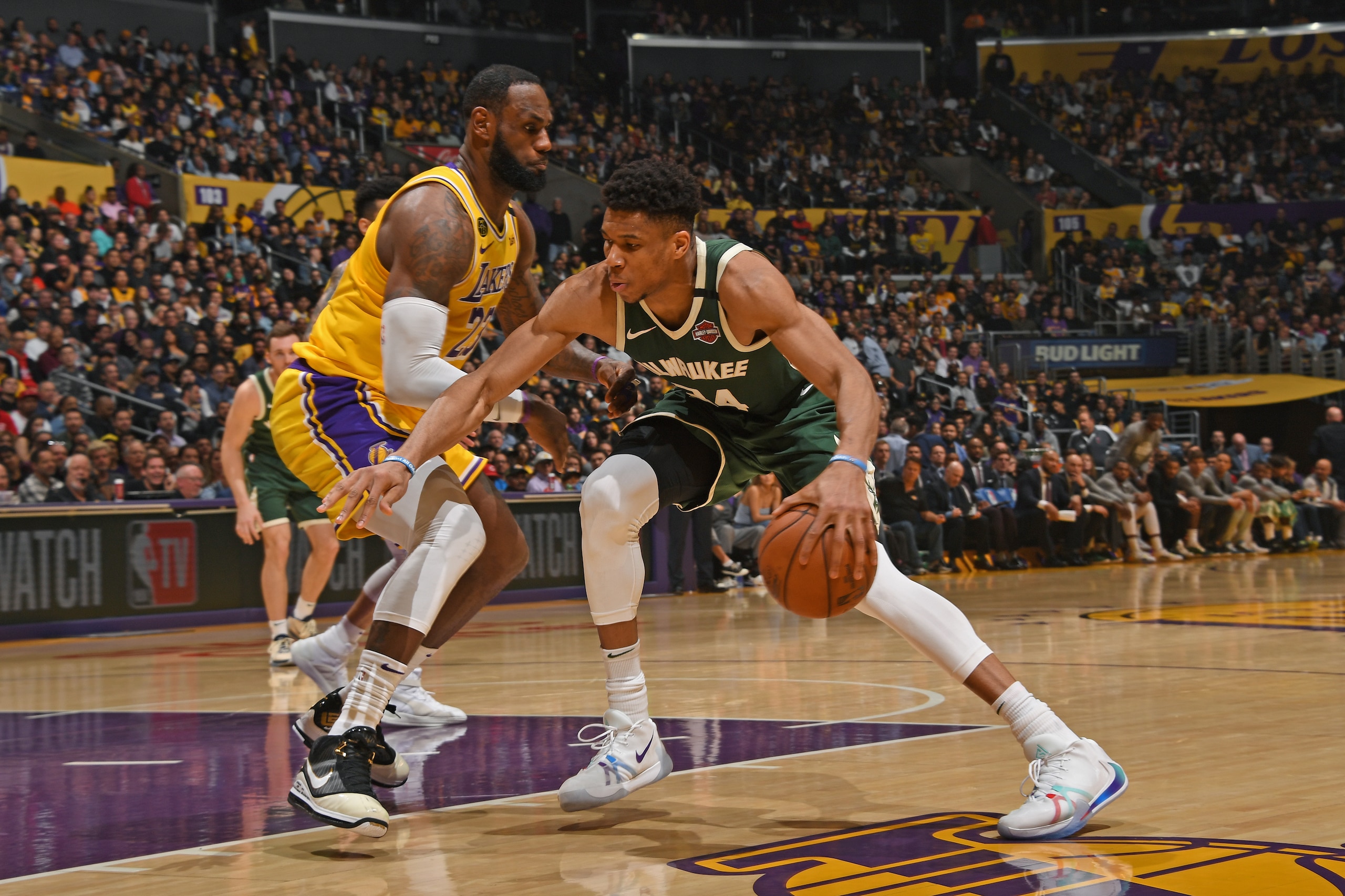 LOS ANGELES, CA - MARCH 6: Giannis Antetokounmpo #34 of the Milwaukee Bucks handles the ball against LeBron James #23 of the Los Angeles Lakers on March 6, 2020 at STAPLES Center in Los Angeles, California. NOTE TO USER: User expressly acknowledges and ag LOS ANGELES, CA - MARCH 6: Giannis Antetokounmpo #34 of the Milwaukee Bucks handles the ball against LeBron James #23 of the Los Angeles Lakers on March 6, 2020 at STAPLES Center in Los Angeles, California. NOTE TO USER: User expressly acknowledges and ag