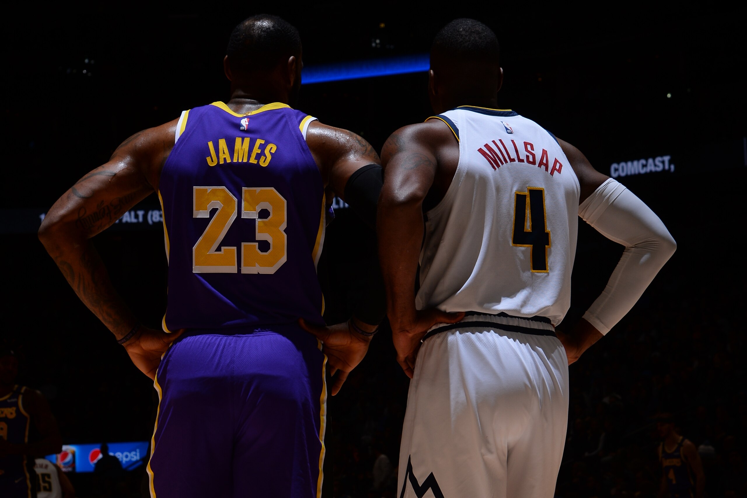 DENVER, CO - FEBRUARY 12: LeBron James #23 of the Los Angeles Lakers and Paul Millsap #4 of the Denver Nuggets looks on during the game on February 12, 2020 at the Pepsi Center in Denver, Colorado. NOTE TO USER: User expressly acknowledges and agrees that
