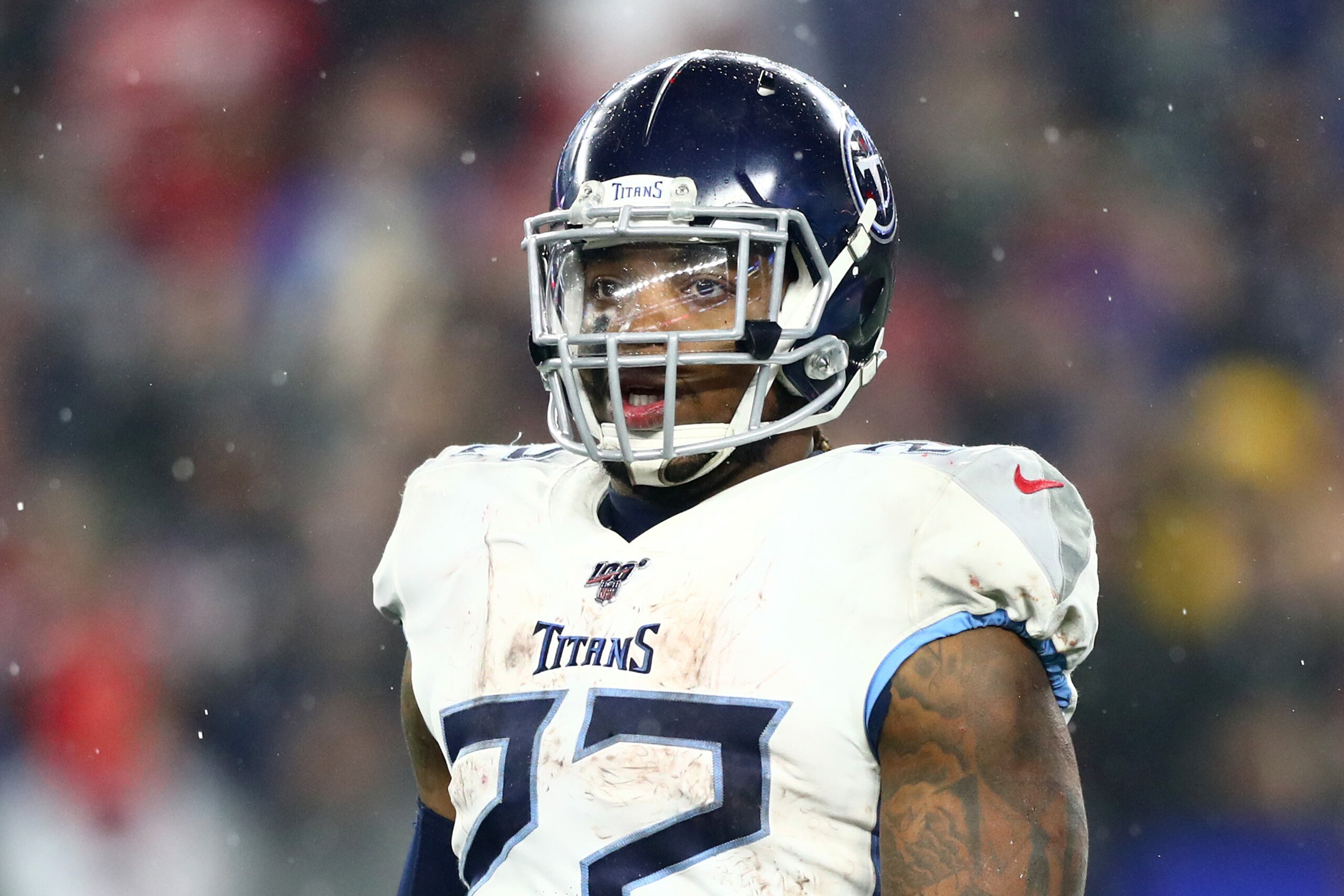 FOXBOROUGH, MASSACHUSETTS - JANUARY 04: Derrick Henry #22 of the Tennessee Titans looks on as they play against the New England Patriots in the AFC Wild Card Playoff game at Gillette Stadium on January 04, 2020 in Foxborough, Massachusetts. The Titans won FOXBOROUGH, MASSACHUSETTS - JANUARY 04: Derrick Henry #22 of the Tennessee Titans looks on as they play against the New England Patriots in the AFC Wild Card Playoff game at Gillette Stadium on January 04, 2020 in Foxborough, Massachusetts. The Titans won