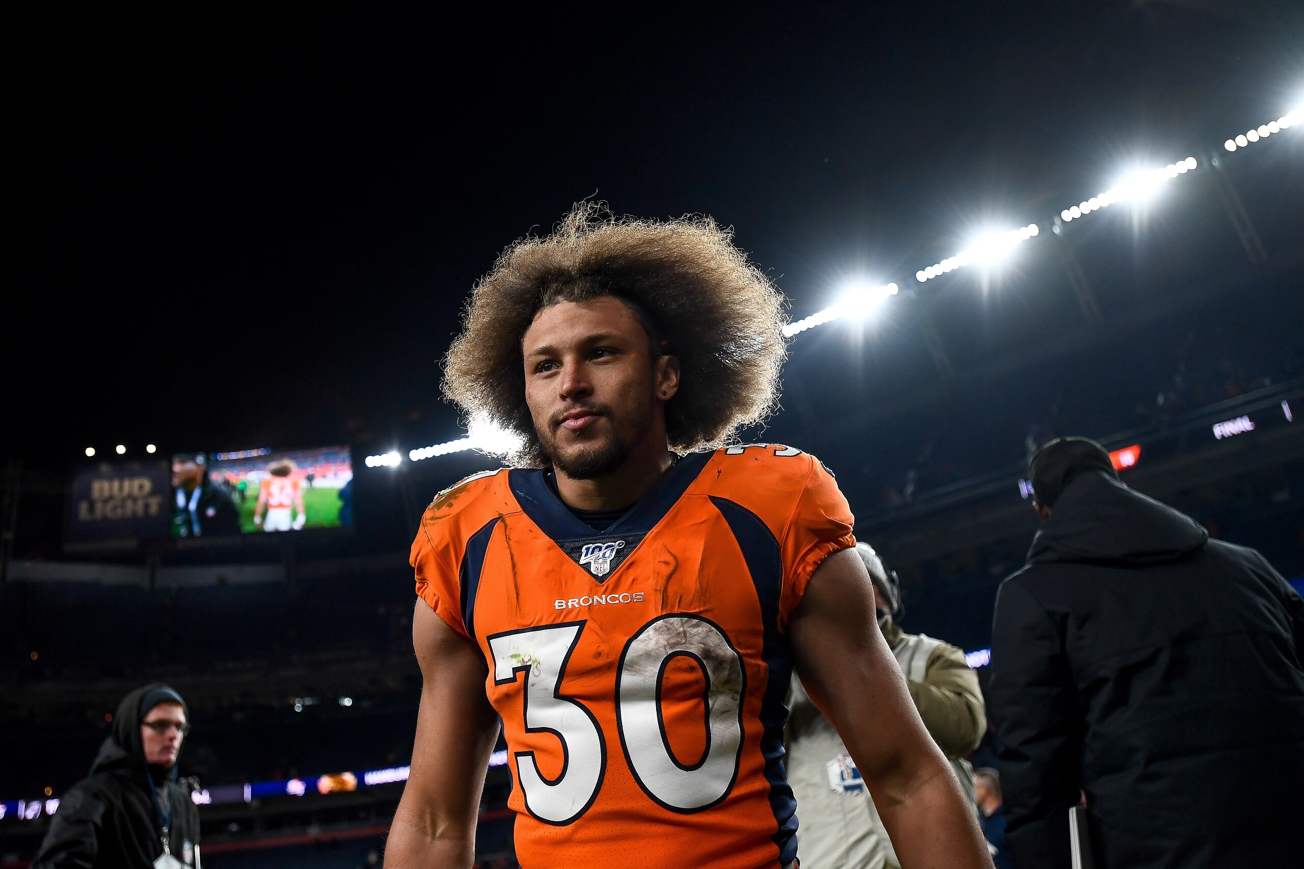 DENVER, CO - DECEMBER 29:  Phillip Lindsay #30 of the Denver Broncos walks off the field after a 16-15 win over the Oakland Raiders at Empower Field at Mile High on December 29, 2019 in Denver, Colorado.  (Photo by Dustin Bradford/Getty Images)