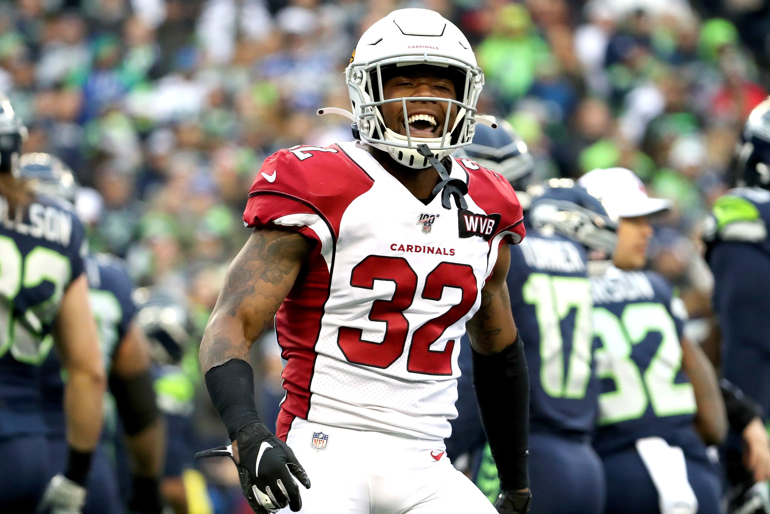 SEATTLE, WASHINGTON - DECEMBER 22: Strong safety Budda Baker #32 of the Arizona Cardinals celebrates after a defensive stop against the Seattle Seahawks during the game at CenturyLink Field on December 22, 2019 in Seattle, Washington. (Photo by Abbie Parr
