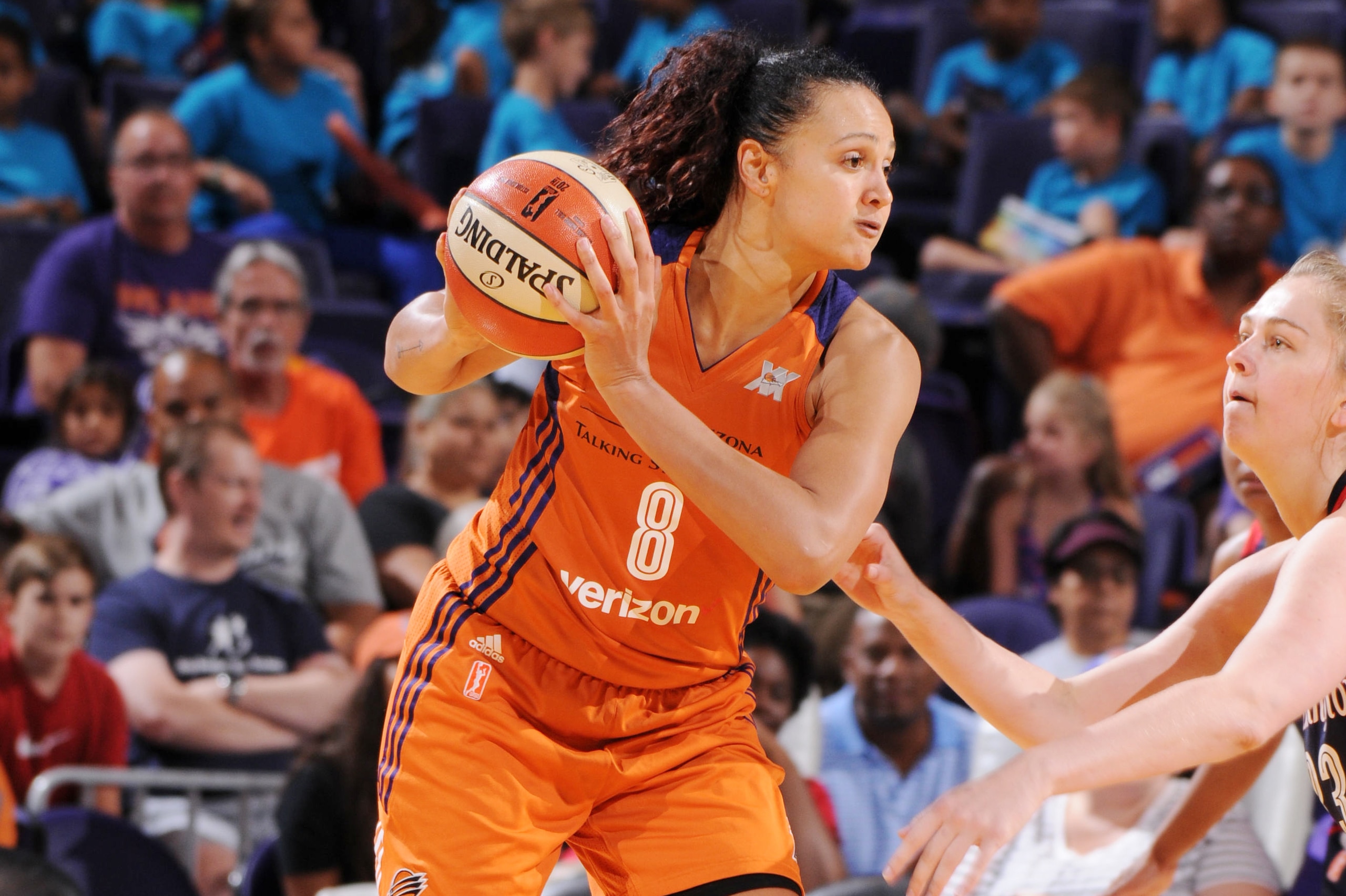 PHOENIX, AZ - JULY 13:  Mistie Bass #8 of the Phoenix Mercury handles the ball against the Washington Mystics on July 13, 2016 at Talking Stick Resort Arena in Phoenix, Arizona. NOTE TO USER: User expressly acknowledges and agrees that, by downloading and