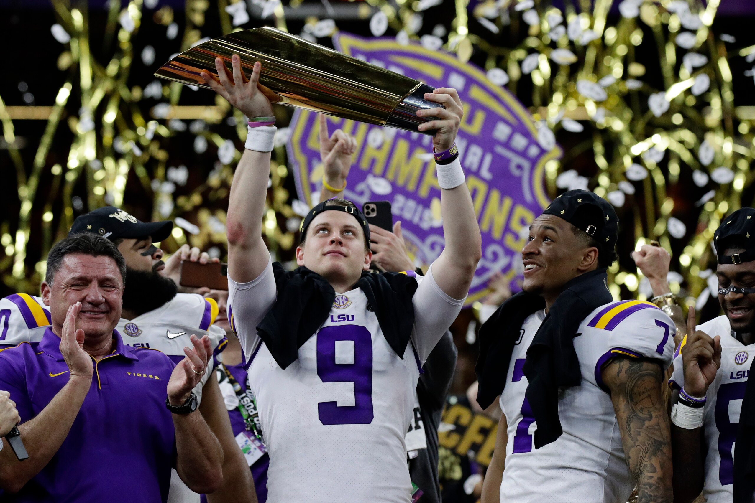 Joe Burrow and LSU hoisted the championship trophy in the 2019 season.