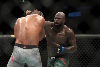 Rozenstruik (right) hits Alistair Overeem