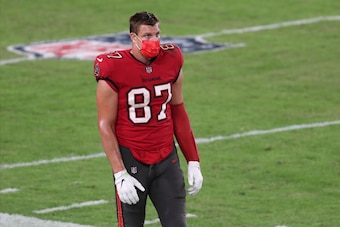 Masks became mandatory for players on the sidelines, like Tampa Bay's Rob Gronkowski, as of Week 12.