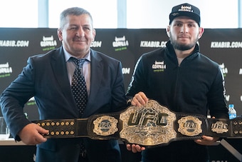 Abdulmanap Nurmagomedov (left) and his son, then UFC lightweight champ Khabib Nurmagomedov