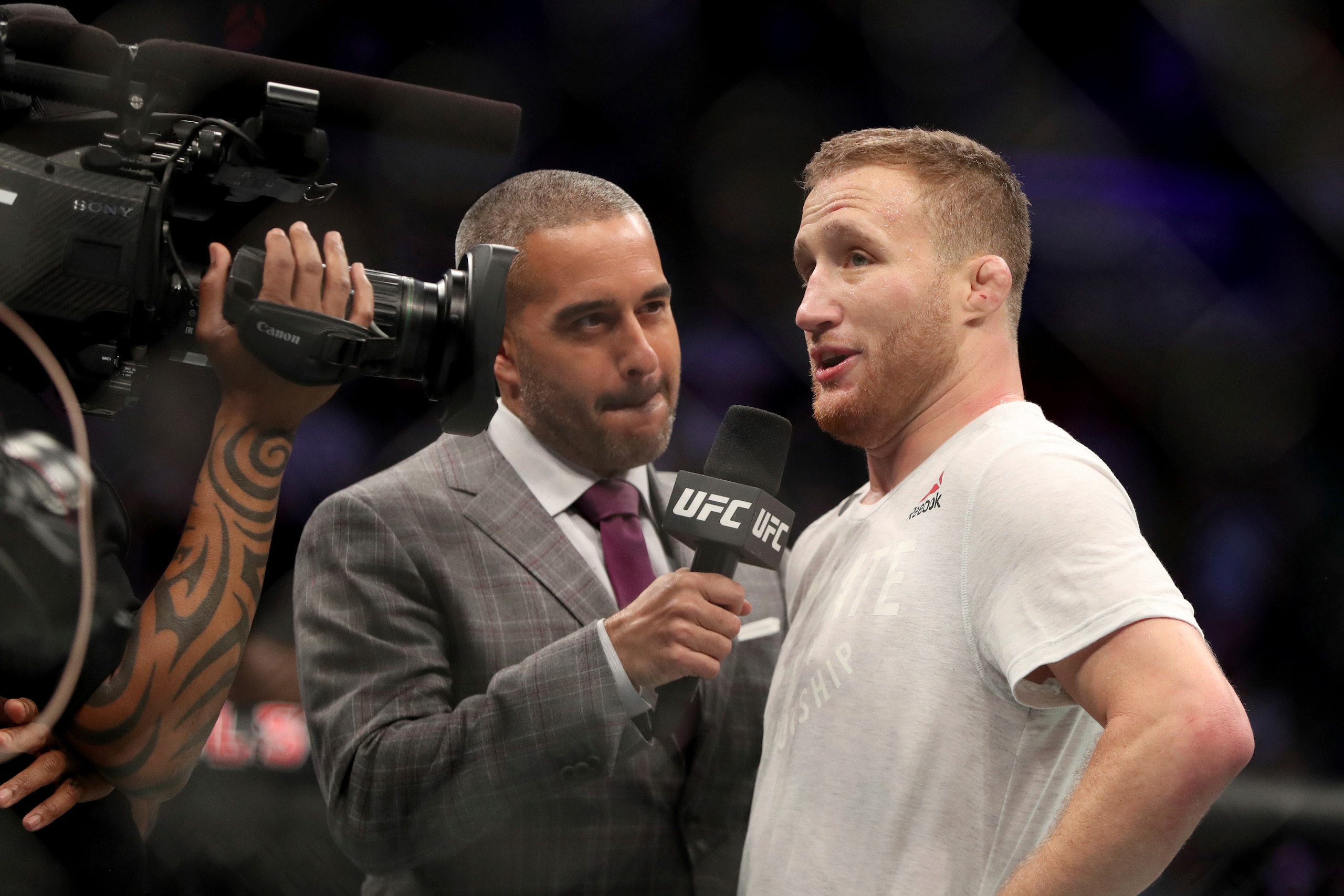 Jon Anik (left) interviews Justin Gaethje in 2019 Jon Anik (left) interviews Justin Gaethje in 2019