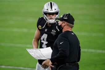 Las Vegas Raiders quarterback Derek Carr and head coach Jon Gruden