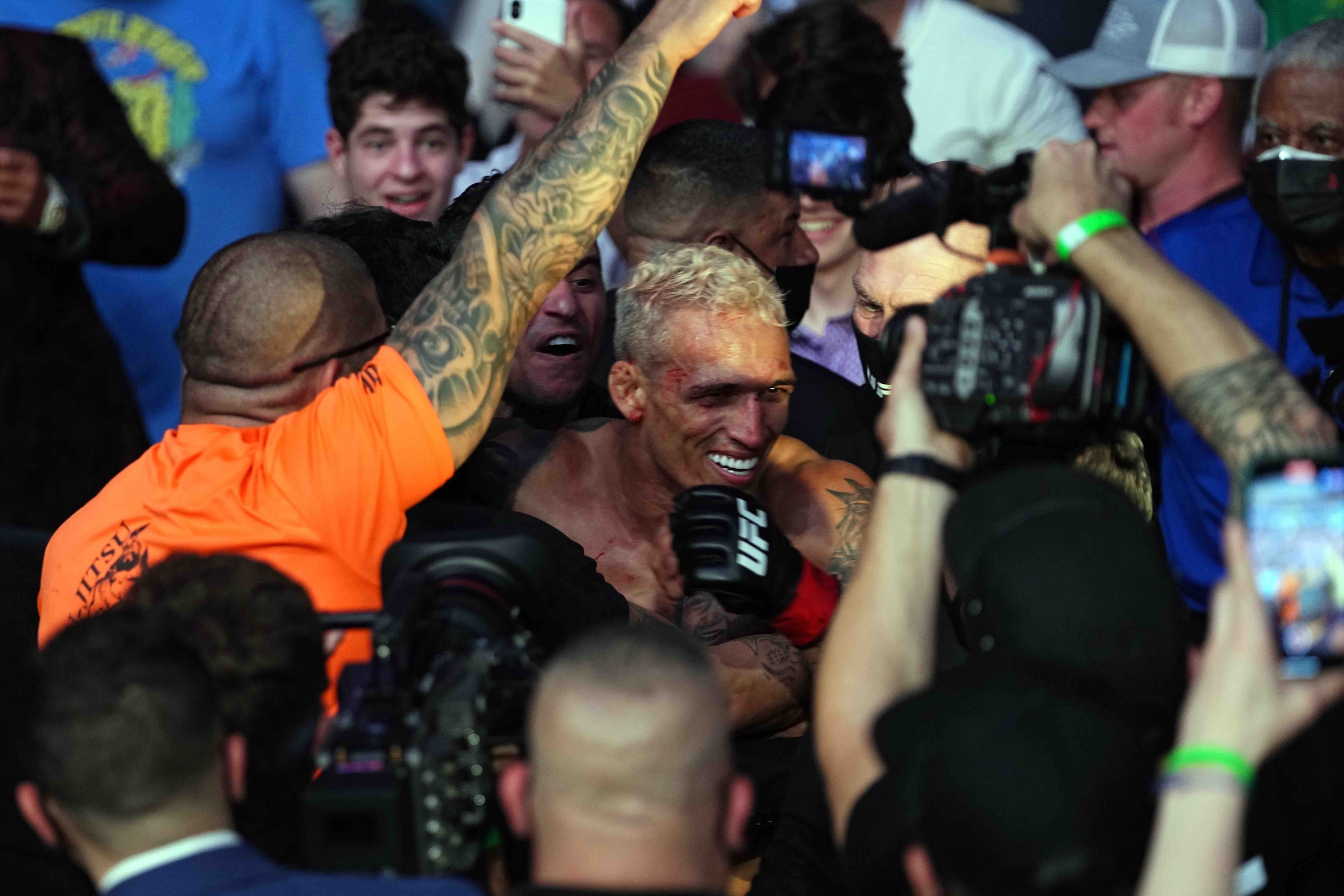Oliveira (center) in the crowd Oliveira (center) in the crowd