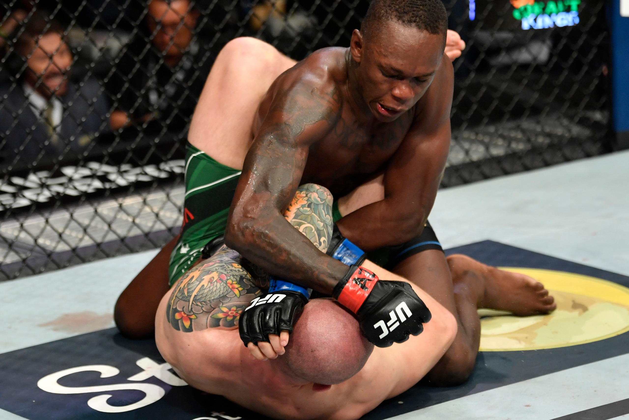 GLENDALE, ARIZONA - JUNE 12: Israel Adesanya of Nigeria punches Marvin Vettori of Italy in their UFC middleweight championship fight during the UFC 263 event at Gila River Arena on June 12, 2021 in Glendale, Arizona. (Photo by Jeff Bottari/Zuffa LLC)