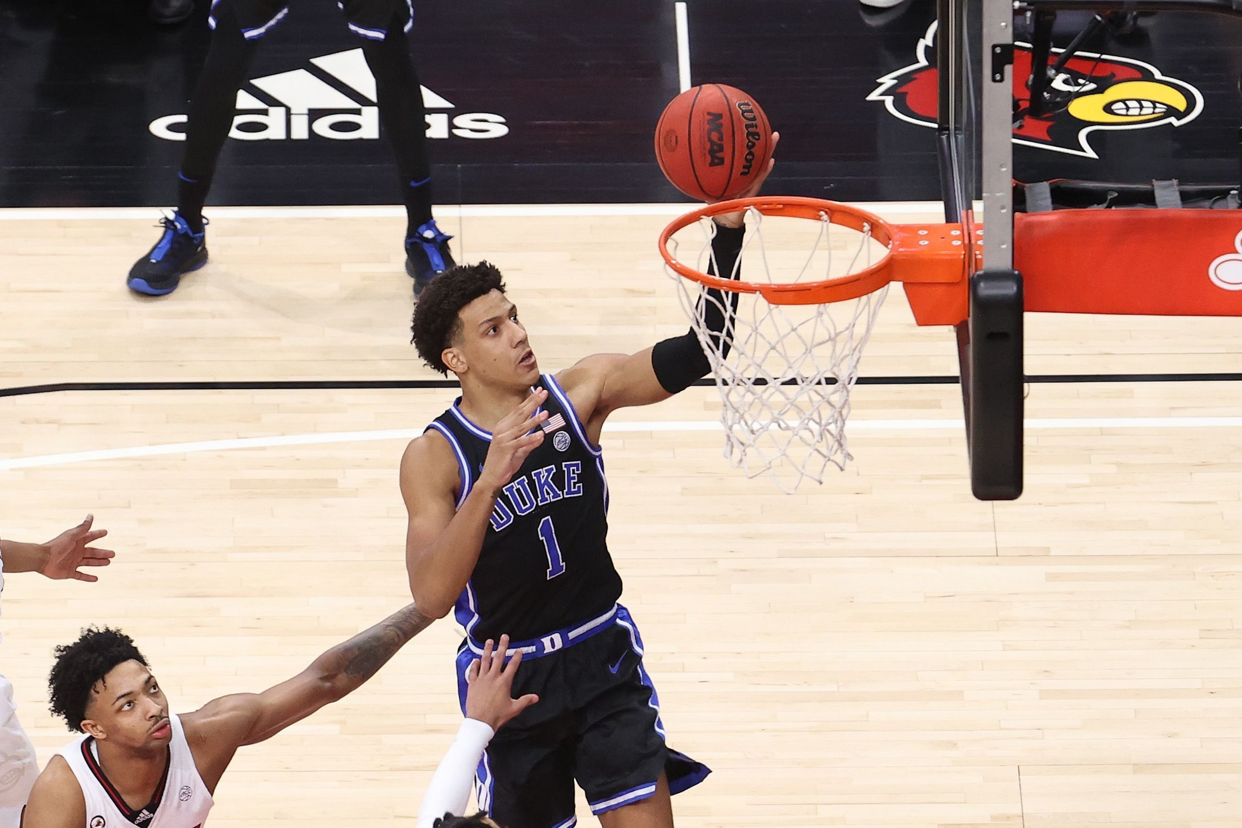LOUISVILLE, KENTUCKY - JANUARY 23:  	Jalen Johnson #1 of the Duke Blue Devils shoots the ball against the Louisville Cardinals at KFC YUM! Center on January 23, 2021 in Louisville, Kentucky. (Photo by Andy Lyons/Getty Images)