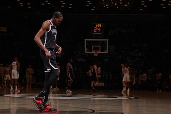 BROOKLYN, NY - JUNE 19: Kevin Durant #7 of the Brooklyn Nets looks on during the game against the Milwaukee Bucks during Round 2, Game 7 of the 2021 NBA Playoffs on June 19, 2021 at Barclays Center in Brooklyn, New York. NOTE TO USER: User expressly ackno