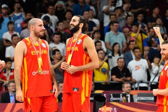 BEIJING, CHINA - SEPTEMBER 15: Quino Colom #1, and Ricky Rubio #9 of Spain smile after receiving his medal after winning the 2019 FIBA World Cup Final against Argentina at the Cadillac Arena on September 15, 2019 in Beijing, China. NOTE TO USER: User expr
