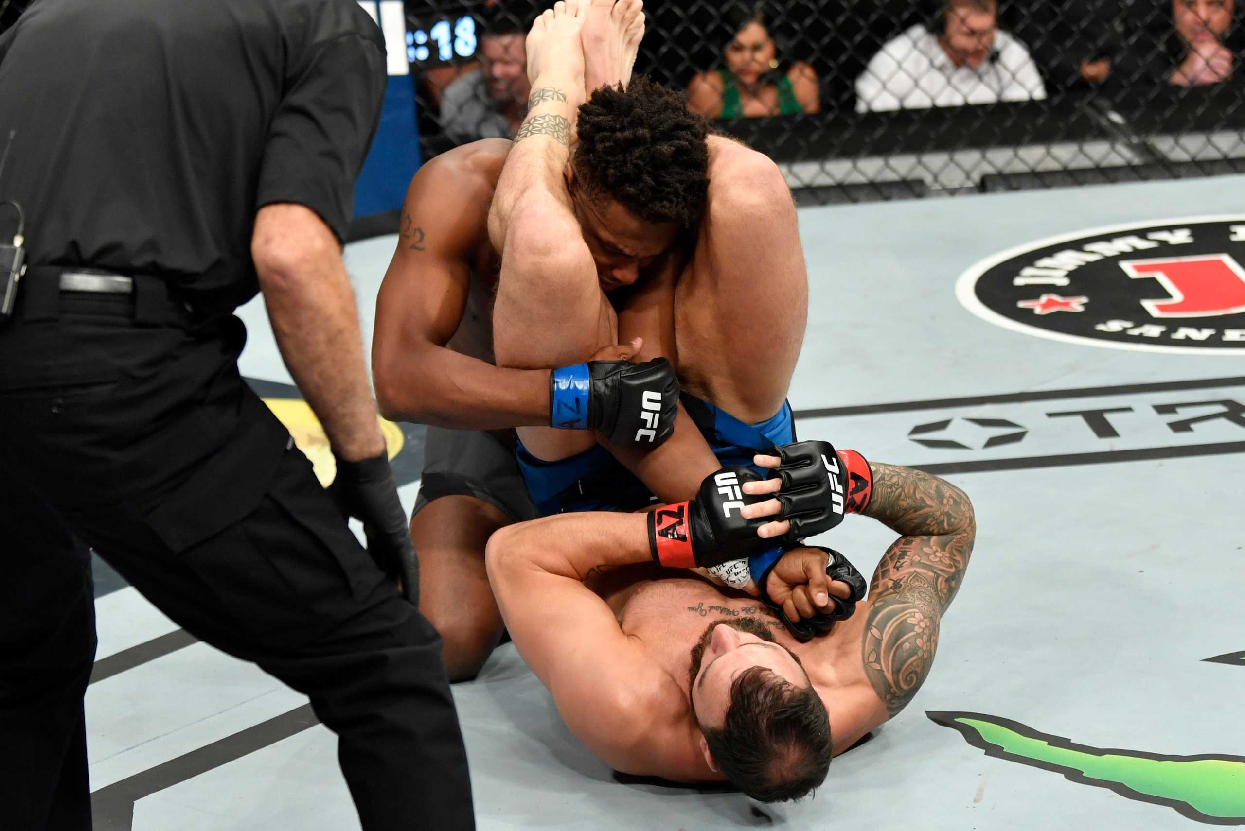 GLENDALE, ARIZONA - JUNE 12: Paul Craig of Scotland secures an arm bar against Jamahal Hill in their light heavyweight fight during the UFC 263 event at Gila River Arena on June 12, 2021 in Glendale, Arizona. (Photo by Jeff Bottari/Zuffa LLC)