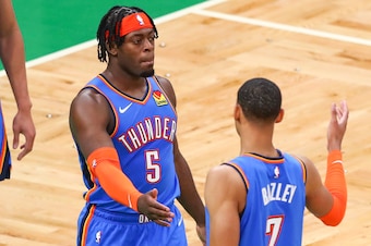 BOSTON, MA - APRIL 27:  Luguentz Dort #5 reacts with Darius Bazley #7 of the Oklahoma City Thunder during a game against the Boston Celtics at TD Garden on April 27, 2021 in Boston, Massachusetts. NOTE TO USER: User expressly acknowledges and agrees that,