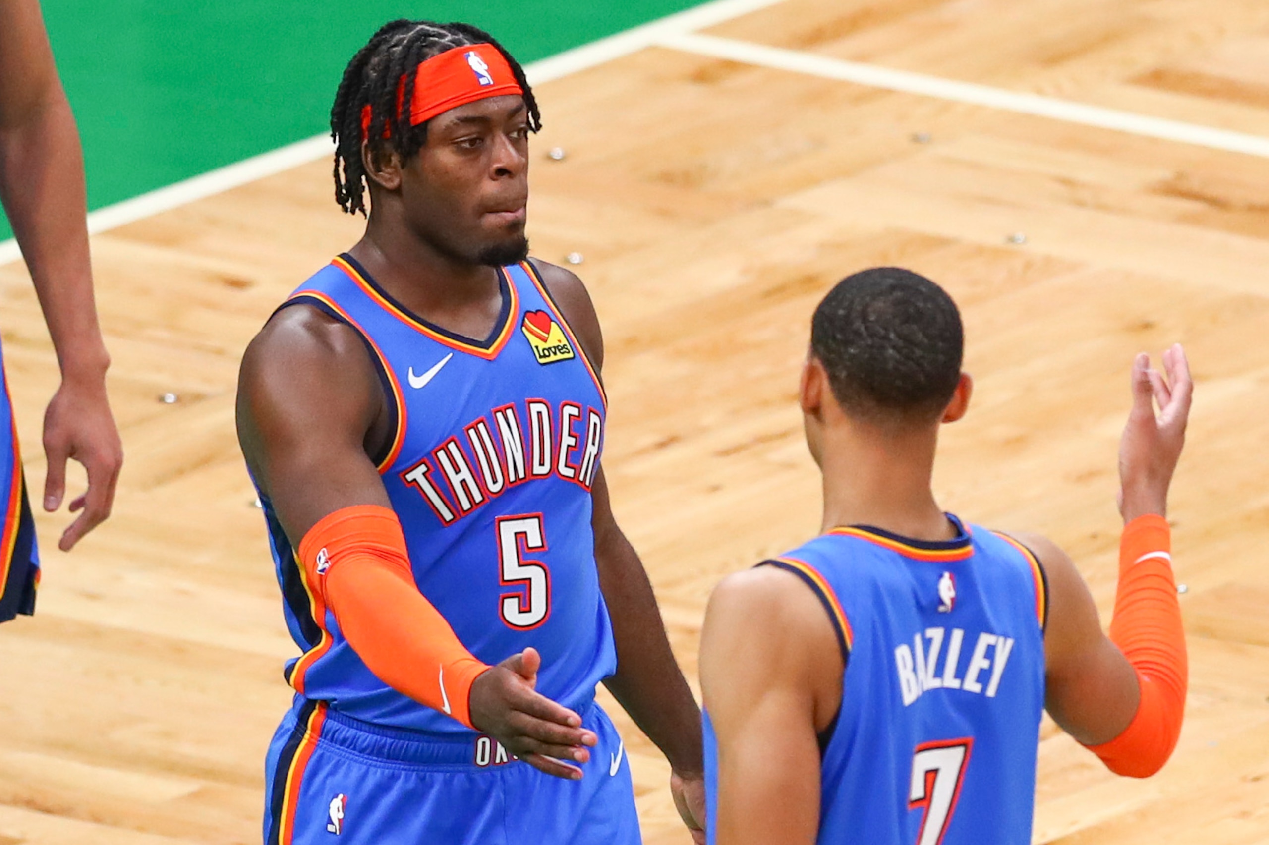 BOSTON, MA - APRIL 27:  Luguentz Dort #5 reacts with Darius Bazley #7 of the Oklahoma City Thunder during a game against the Boston Celtics at TD Garden on April 27, 2021 in Boston, Massachusetts. NOTE TO USER: User expressly acknowledges and agrees that,
