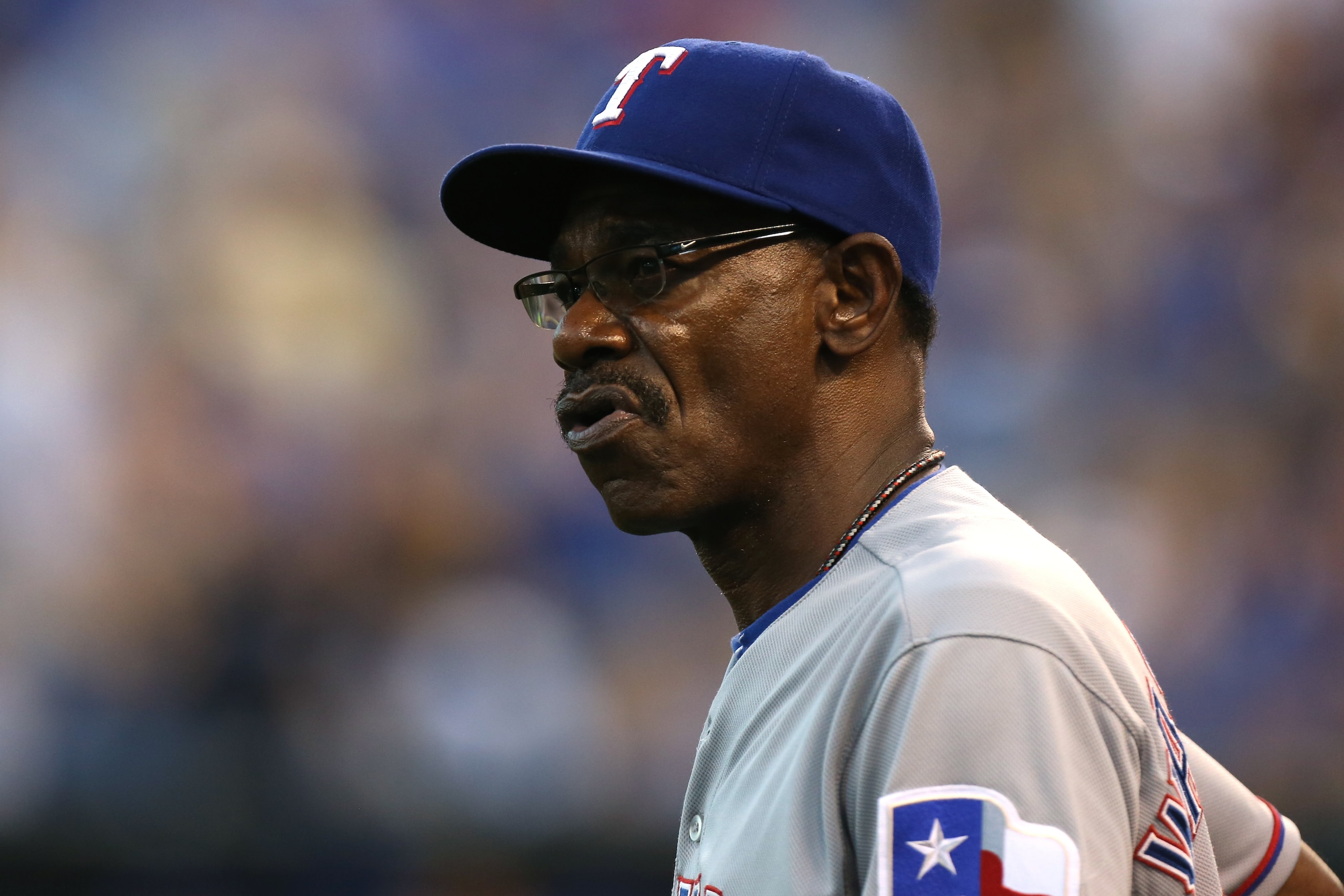 KANSAS CITY, MO - SEPTEMBER 3: Ron Washington #38 manager of the Texas Rangers waits for an official ruling if Alex Gordon of the Kansas City Royals caught a ball hit by Ryan Rua of the Texas Rangers in the second inning at Kauffman Stadium on September KANSAS CITY, MO - SEPTEMBER 3: Ron Washington #38 manager of the Texas Rangers waits for an official ruling if Alex Gordon of the Kansas City Royals caught a ball hit by Ryan Rua of the Texas Rangers in the second inning at Kauffman Stadium on September