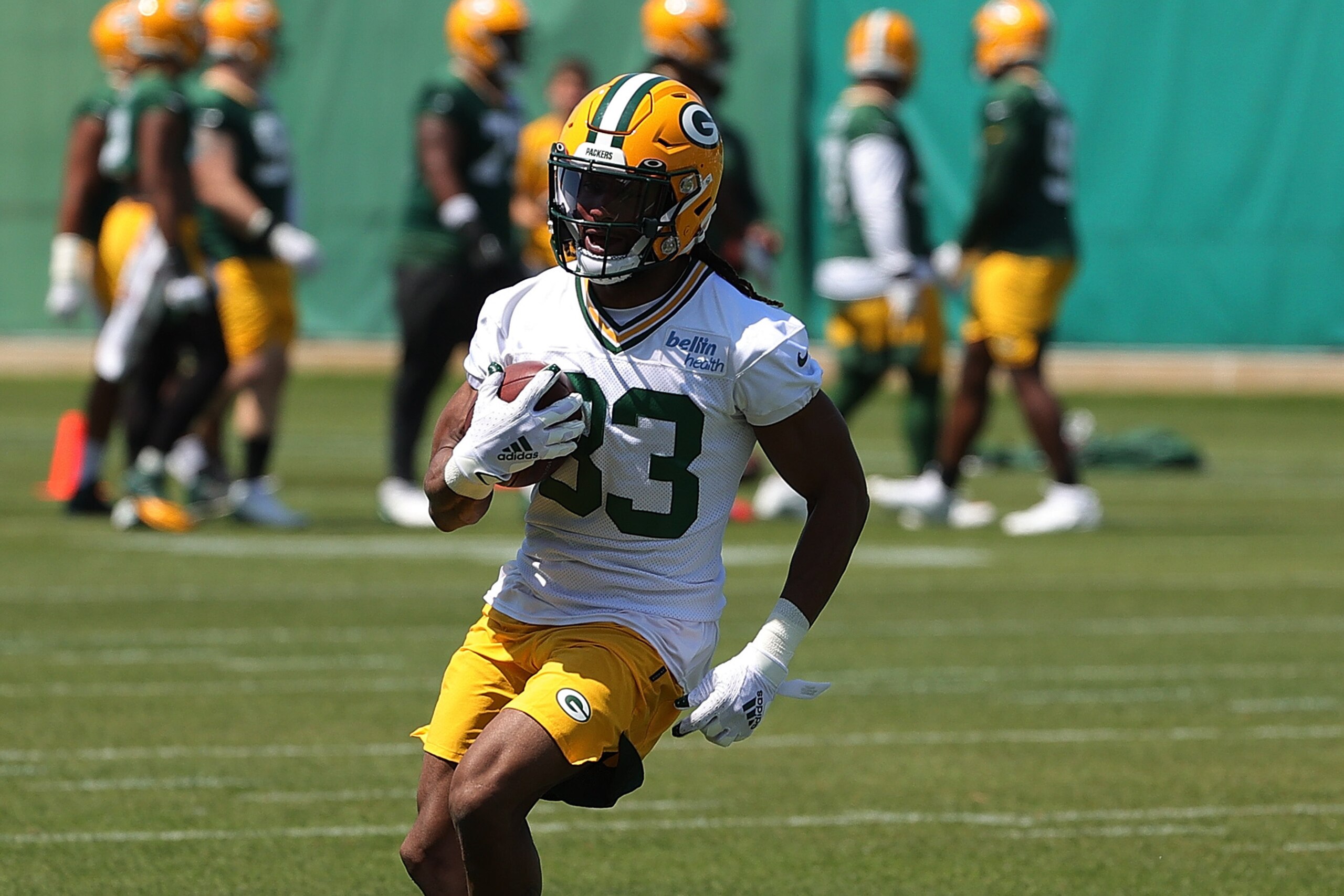 ASHWAUBENON, WISCONSIN - JUNE 09: Aaron Jones #33 of the Green Bay Packers works out during training camp at Ray Nitschke Field on June 09, 2021 in Ashwaubenon, Wisconsin. (Photo by Stacy Revere/Getty Images)