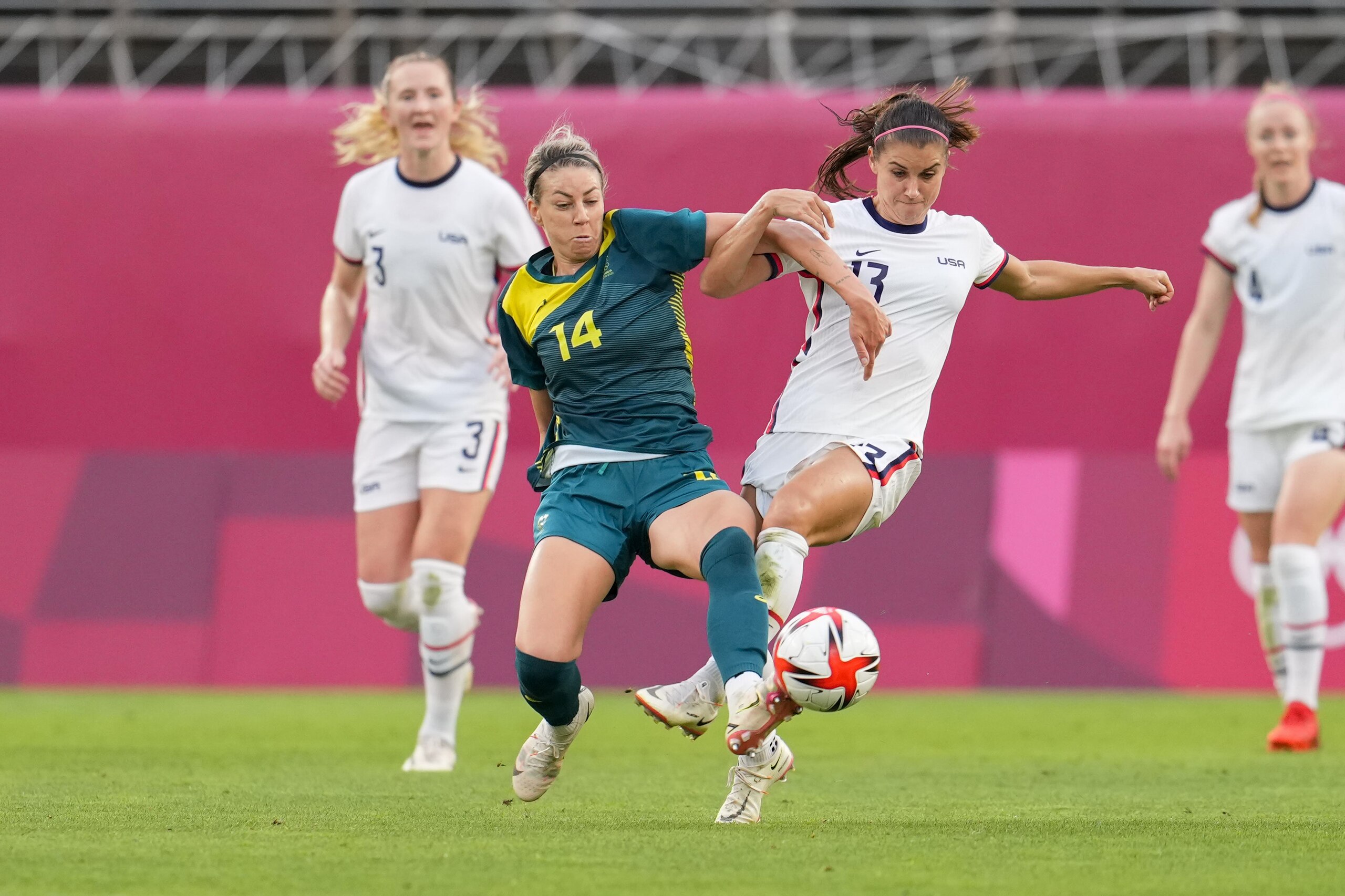 KASHIMA, JAPAN - JULY 27: Alanna Kennedy #14 of Team Australia battles with Alex Morgan #13 of Team United States before a game between Australia and USWNT at Ibaraki Kashima Stadium on July 27, 2021 in Kashima, Japan. (Photo by Brad Smith/ISI Photos/Gett