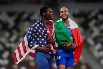 Fred Kerley (left) scored a silver for the United States in his Olympic 100 meters debut.