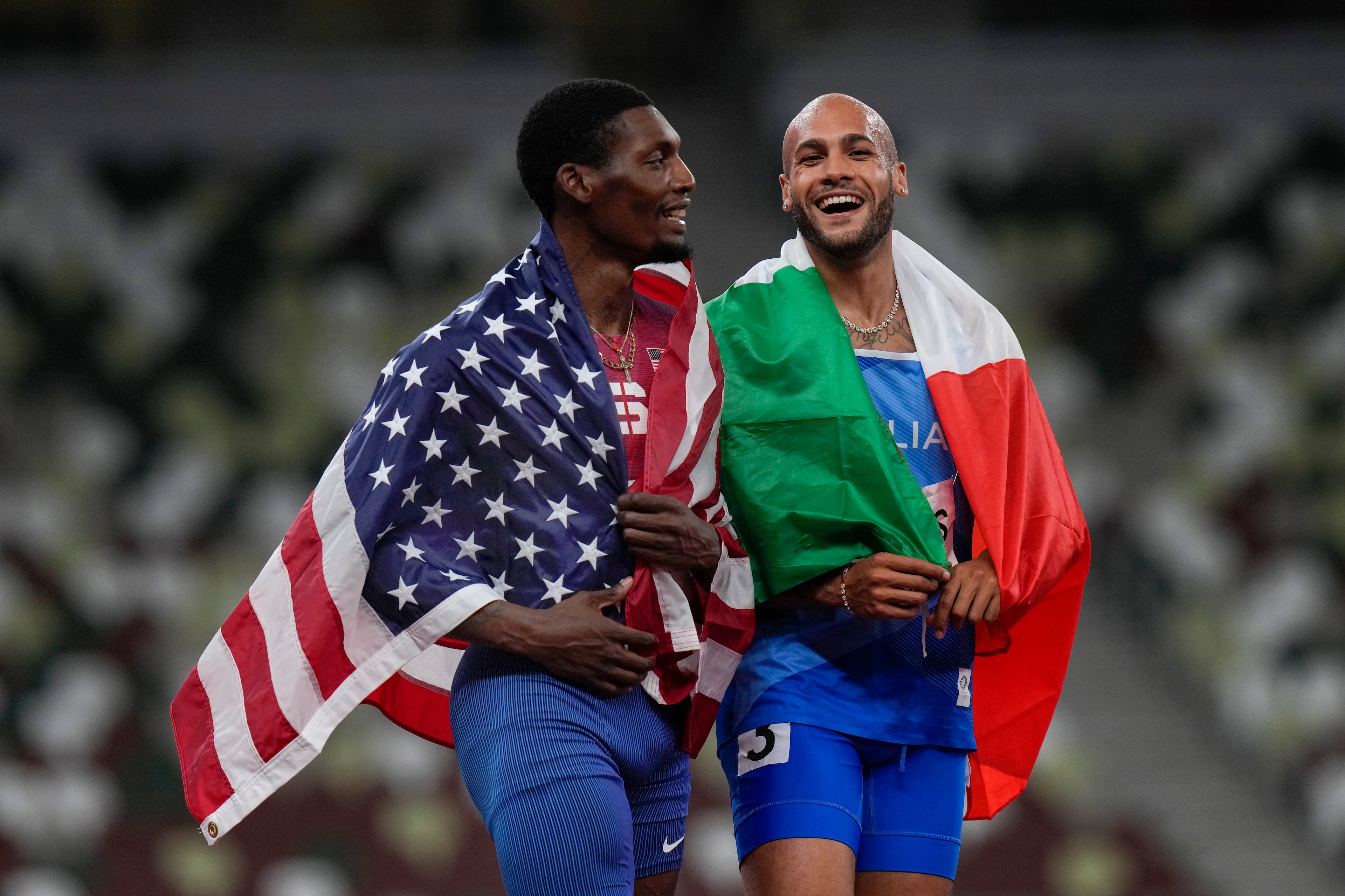 Fred Kerley (left) scored a silver for the United States in his Olympic 100 meters debut.