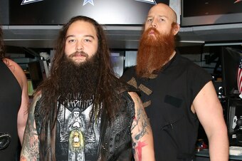 NEW YORK, NY - MARCH 29:  (L-R) WWE professional wrestlers Braun Strowman, Bray Wyatt and Erick Rowan attend WWE WrestleMania Stars Ring The NYSE Opening Bell at New York Stock Exchange on March 29, 2016 in New York City.  (Photo by Monica Schipper/FilmMa