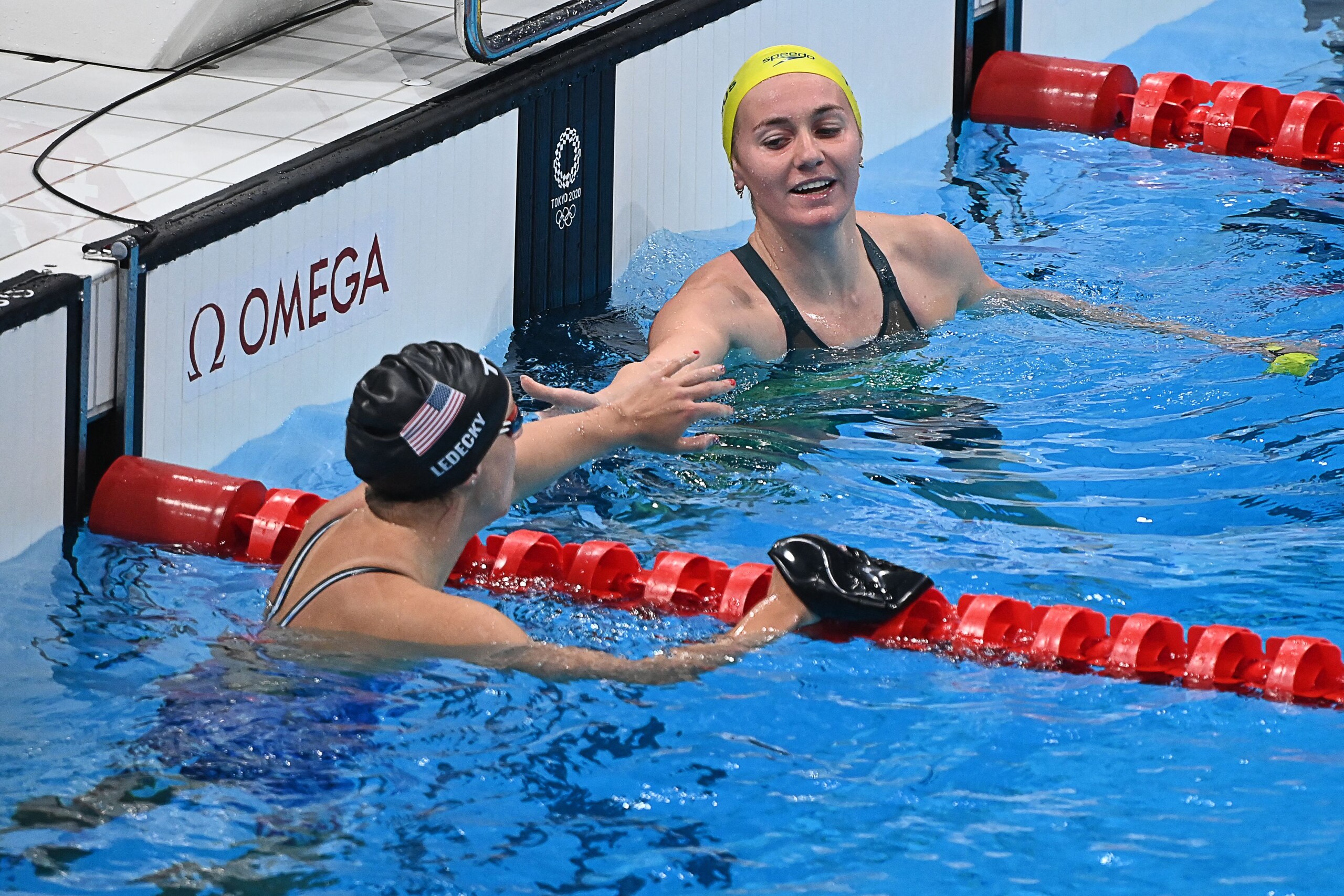 Katie Ledecky congratulates Ariarne Titmus after the 200-meter freestyle final in which Titmus took gold.