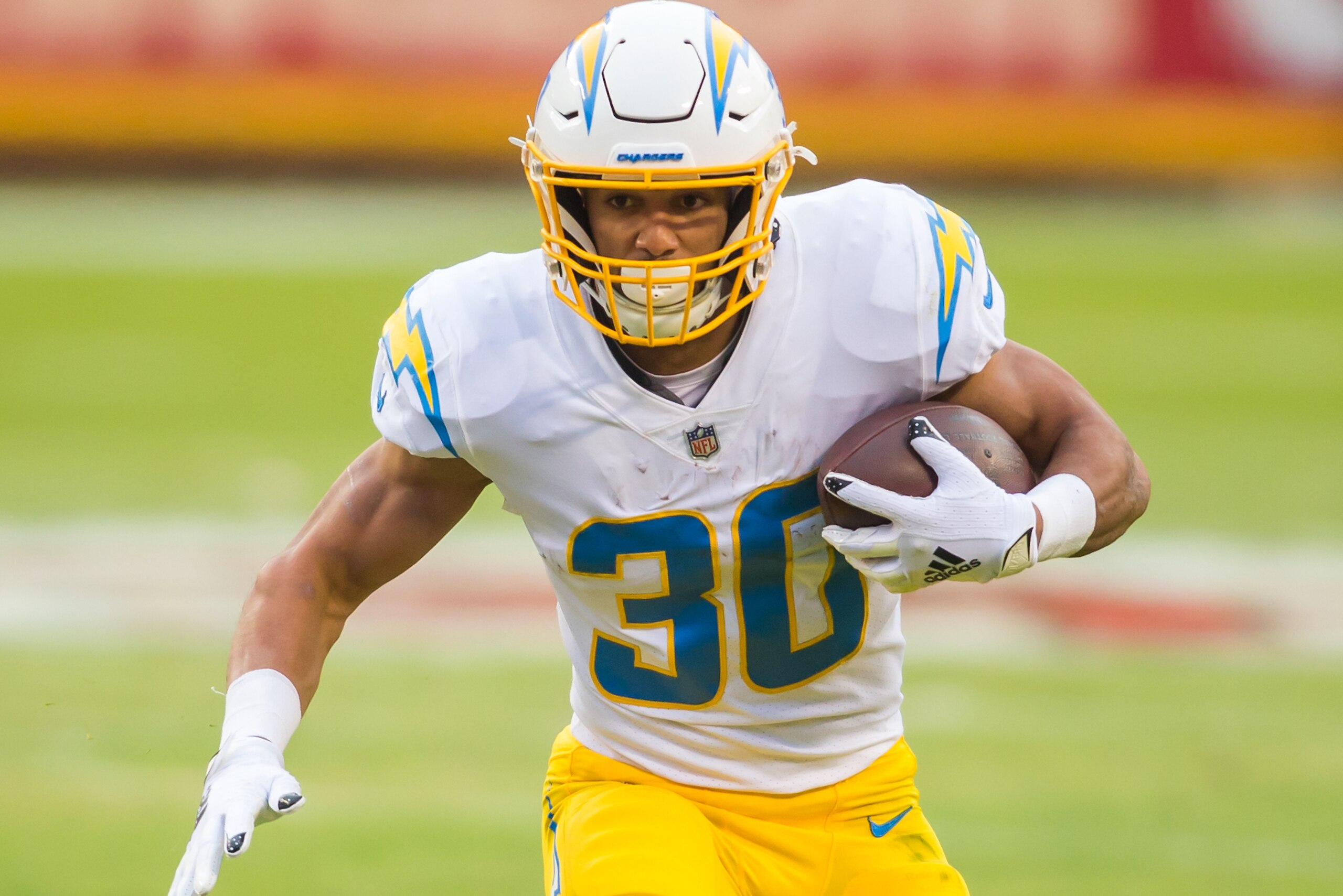 KANSAS CITY, MO - JANUARY 03: Los Angeles Chargers running back Austin Ekeler (30) brings the ball upfield during the game between the Kansas City Chiefs and the Los Angeles Chargers on Sunday January 3, 2021 at Arrowhead Stadium in Kansas City, Missouri KANSAS CITY, MO - JANUARY 03: Los Angeles Chargers running back Austin Ekeler (30) brings the ball upfield during the game between the Kansas City Chiefs and the Los Angeles Chargers on Sunday January 3, 2021 at Arrowhead Stadium in Kansas City, Missouri