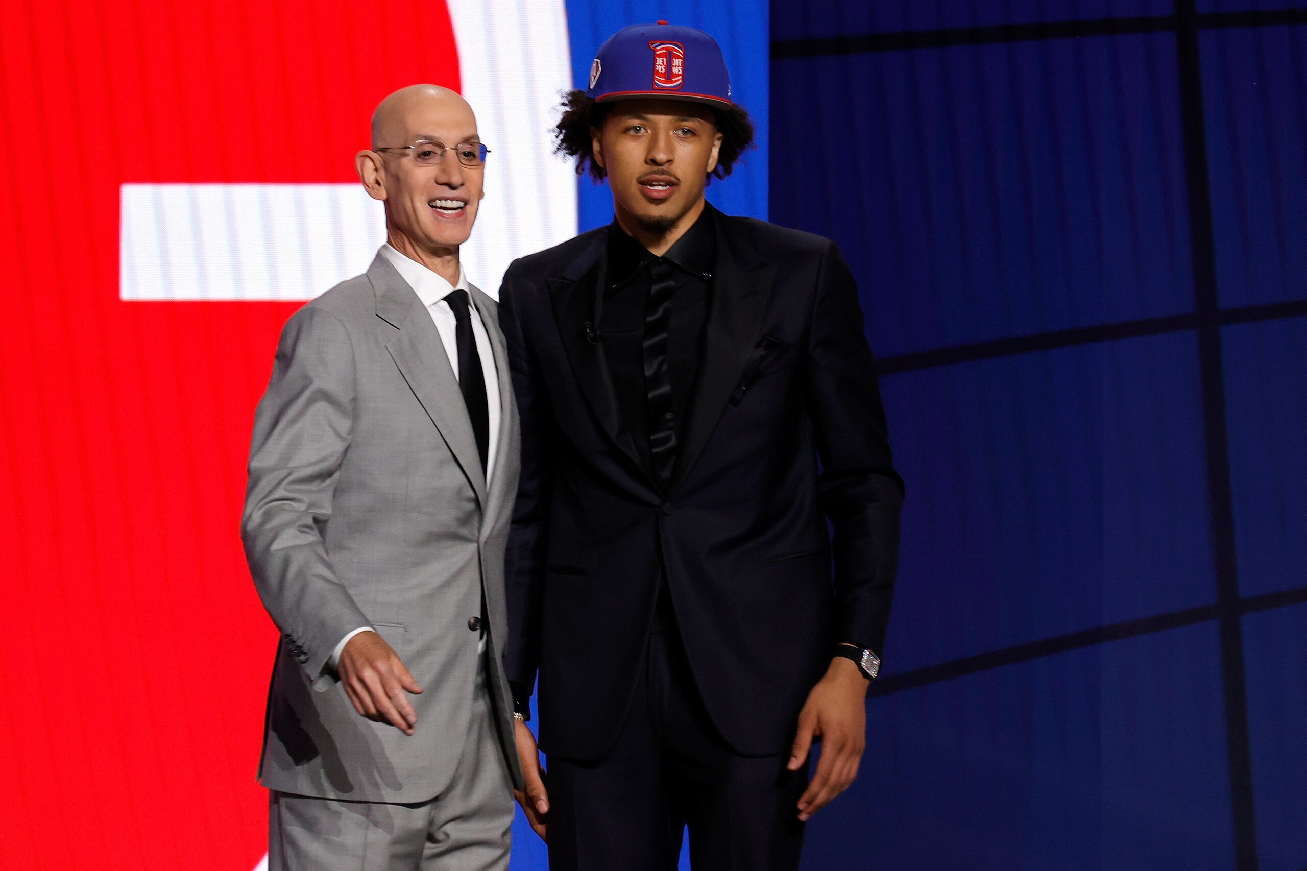 NEW YORK, NEW YORK - JULY 29: NBA commissioner Adam Silver (L) and Cade Cunningham poses for photos after Cunningham was drafted by the Detroit Pistons during the 2021 NBA Draft at the Barclays Center on July 29, 2021 in New York City. (Photo by Arturo Ho NEW YORK, NEW YORK - JULY 29: NBA commissioner Adam Silver (L) and Cade Cunningham poses for photos after Cunningham was drafted by the Detroit Pistons during the 2021 NBA Draft at the Barclays Center on July 29, 2021 in New York City. (Photo by Arturo Ho