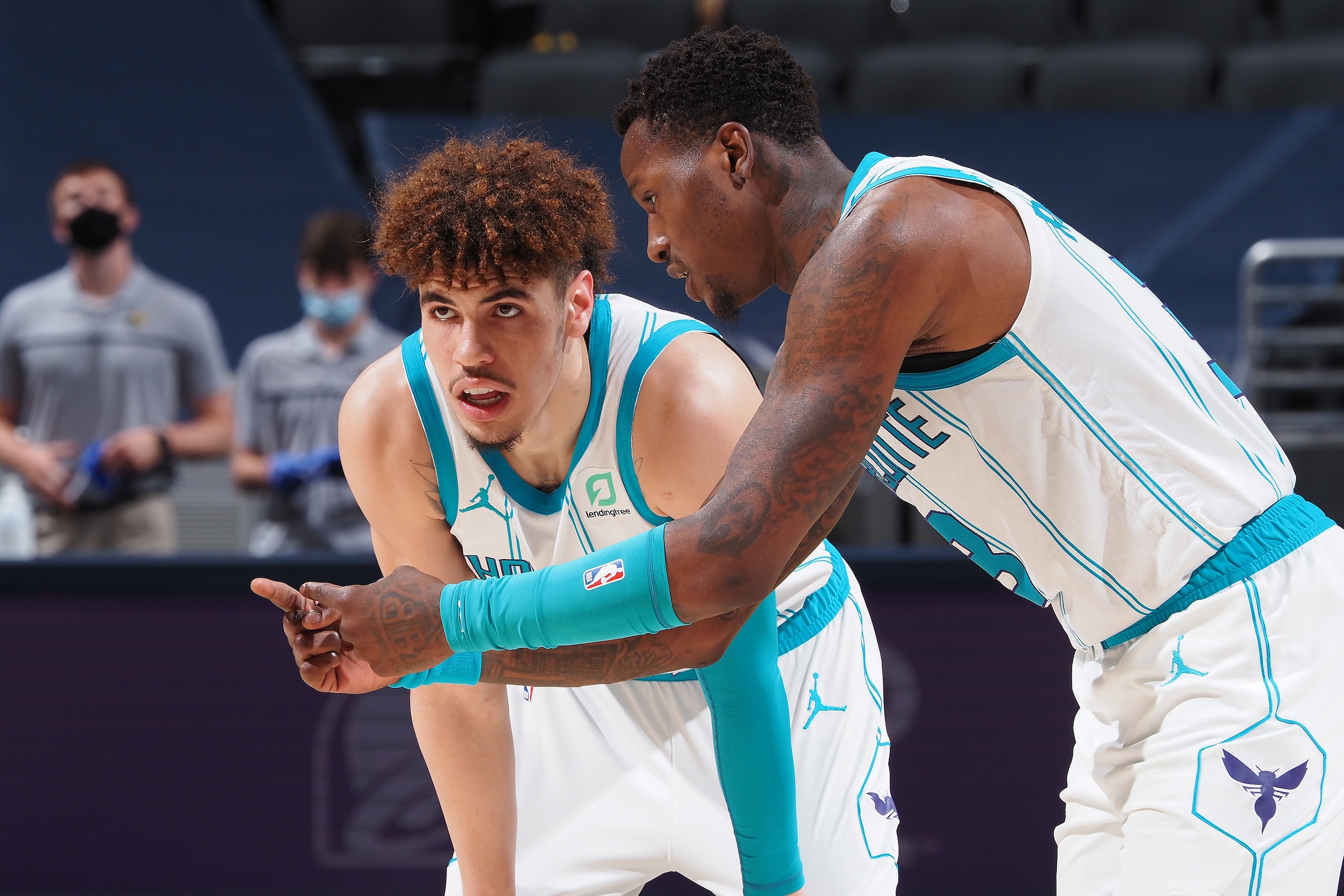 INDIANAPOLIS, IN - MAY 18: LaMelo Ball #2 and Terry Rozier #3 of the Charlotte Hornets talk during the 2021 Play-In Tournament on May 18, 2021 at Bankers Life Fieldhouse in Indianapolis, Indiana. NOTE TO USER: User expressly acknowledges and agrees that, INDIANAPOLIS, IN - MAY 18: LaMelo Ball #2 and Terry Rozier #3 of the Charlotte Hornets talk during the 2021 Play-In Tournament on May 18, 2021 at Bankers Life Fieldhouse in Indianapolis, Indiana. NOTE TO USER: User expressly acknowledges and agrees that,