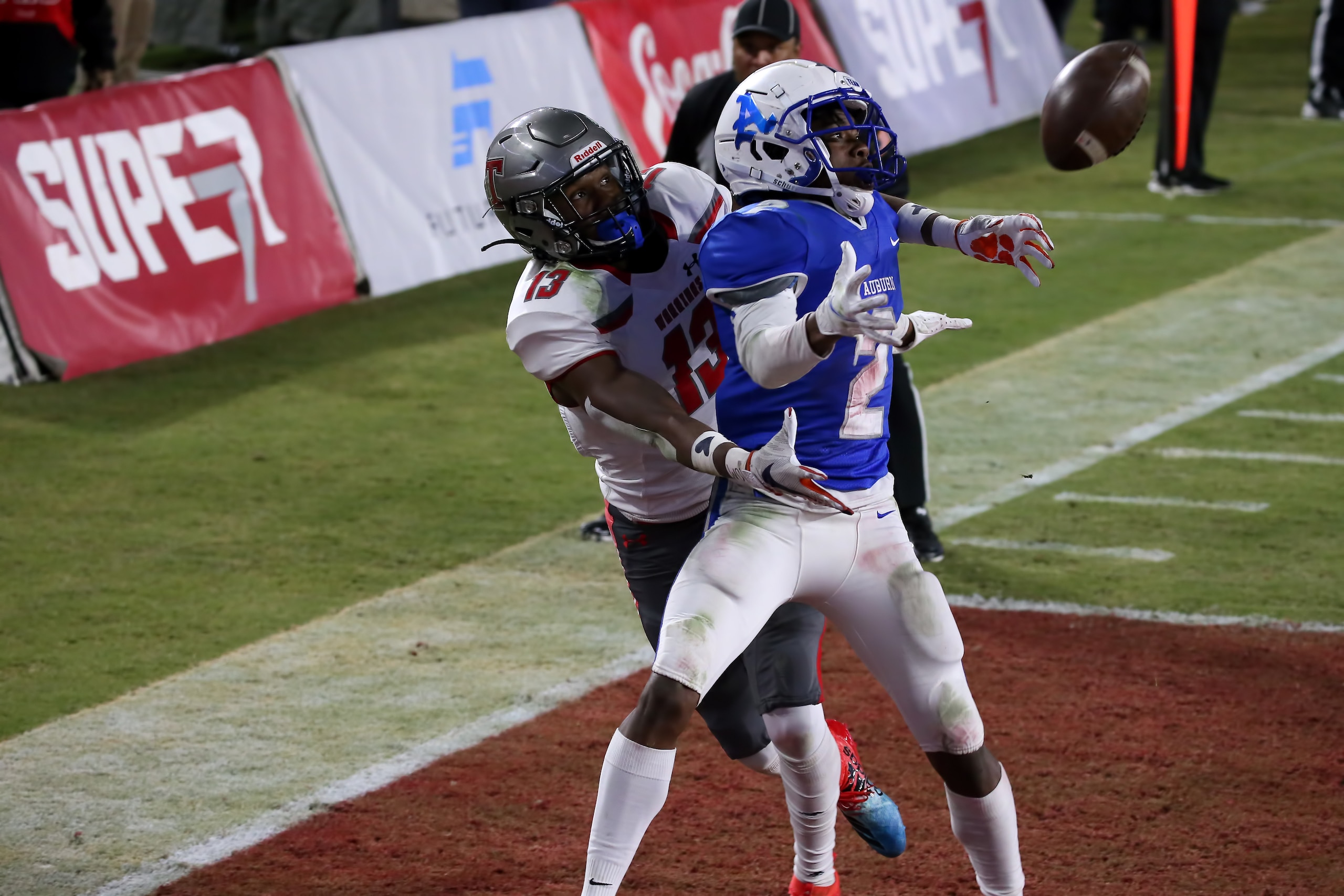 TUSCALOOSA, AL - DECEMBER 02: Auburn Tigers defensive back Quay Nelms is called for pass interference against Thompson Warriors wide receiver JB Mitchell (13) in the Alabama High School 7A championship game between the Thompson Warriors and Auburn Tigers 