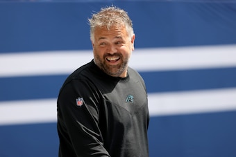 INDIANAPOLIS, INDIANA - AUGUST 15: Head coach Matt Rhule of the Carolina Panthers walks onto the field before the preseason game against the Indianapolis Colts at Lucas Oil Stadium on August 15, 2021 in Indianapolis, Indiana. (Photo by Justin Casterline/G