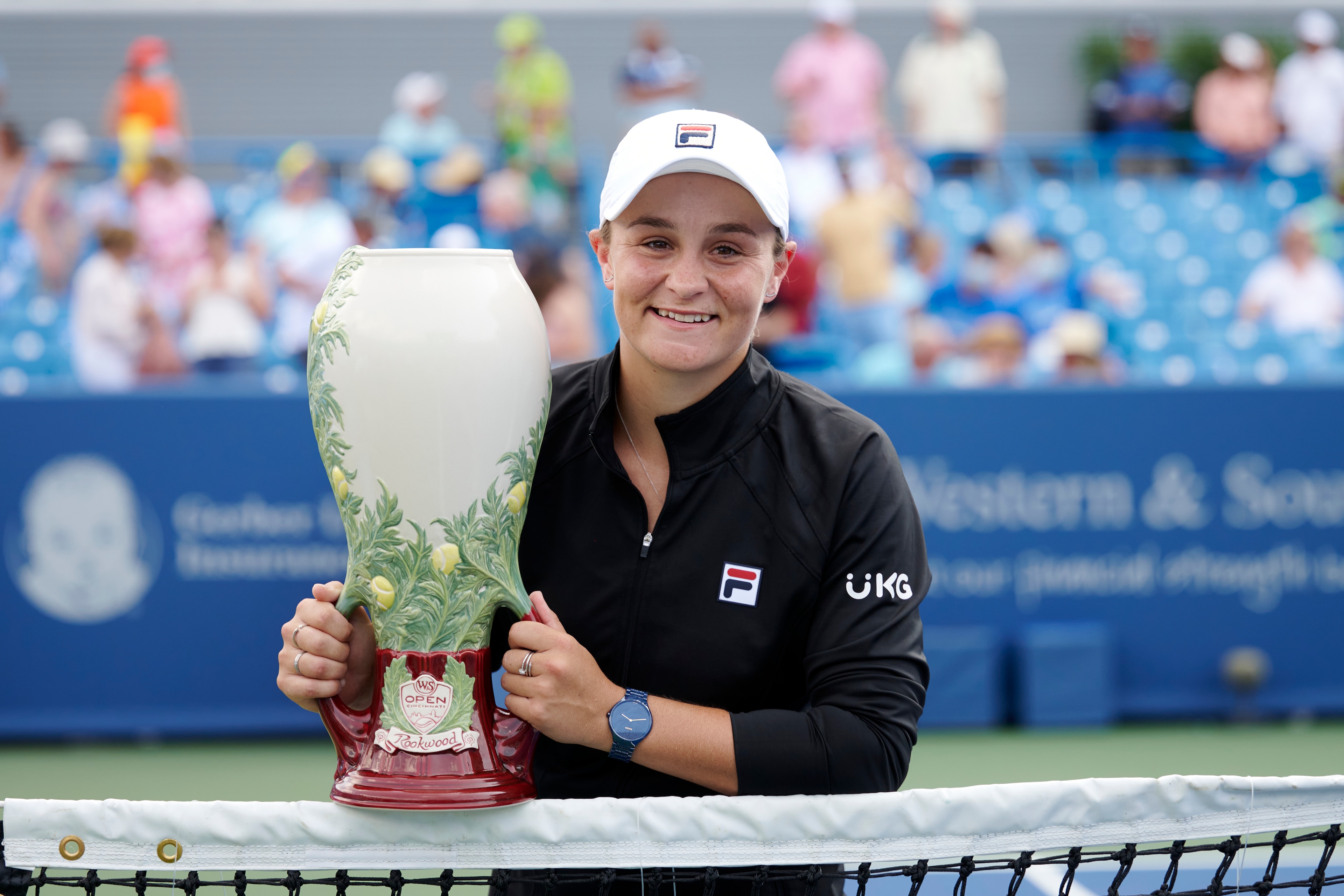 CINCINNATI, OH - AUGUST 22:  Ashleigh Barty of Australia smiles and holds the Rookwood Cup after winning the womens championship match of the Western & Southern Open at the Lindner Family Tennis Center in Mason, Ohio on August 22, 2021. Barty defeated Jil