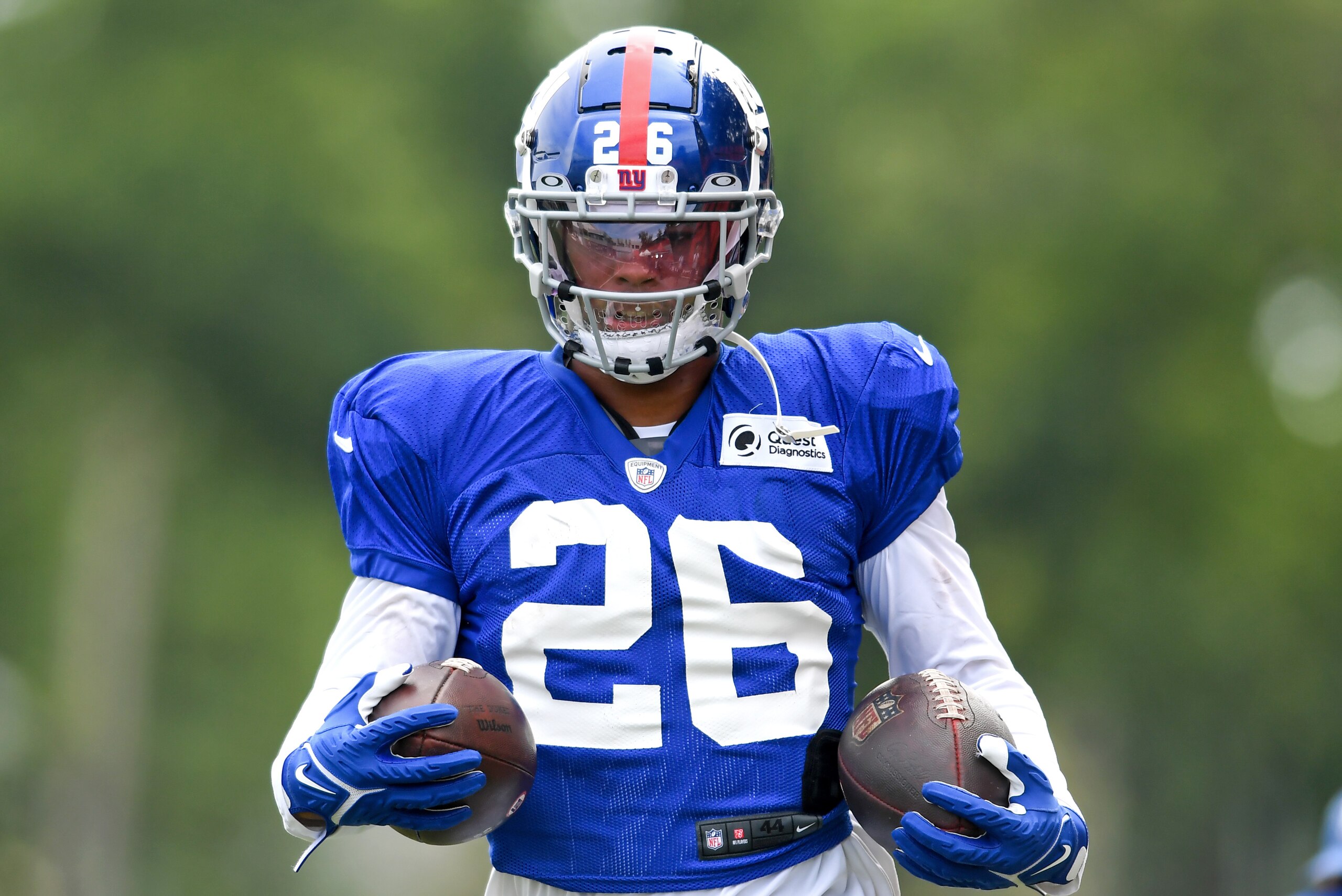 BEREA, OH - AUGUST 19: Running back Saquon Barkley #26 of the New York Giants runs a drill during a joint practice with the Cleveland Browns on August 19, 2021 in Berea, Ohio. (Photo by Nick Cammett/Diamond Images via Getty Images)