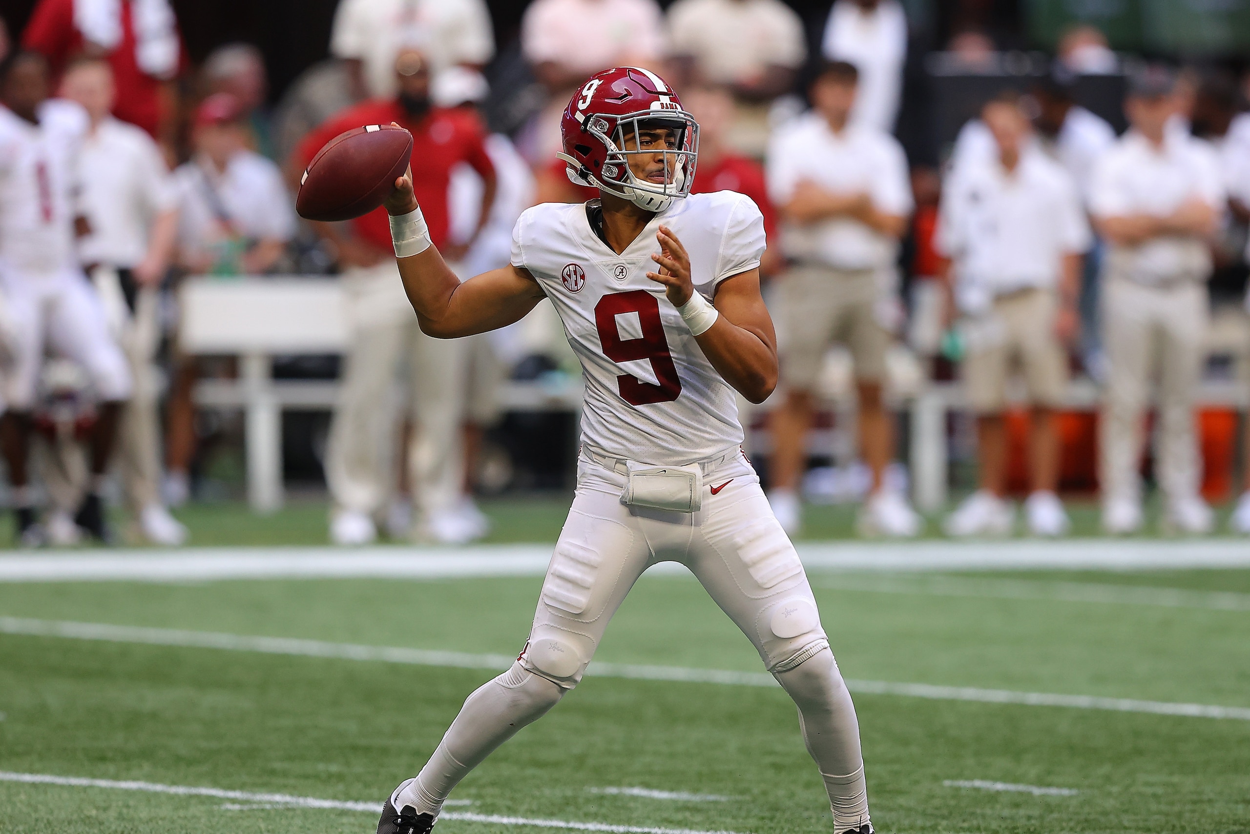 ATLANTA, GEORGIA - SEPTEMBER 04:  Bryce Young #9 of the Alabama Crimson Tide looks to pass against the Miami Hurricanes during the first half of the Chick-fil-A Kick-Off Game at Mercedes-Benz Stadium on September 04, 2021 in Atlanta, Georgia. (Photo by Ke