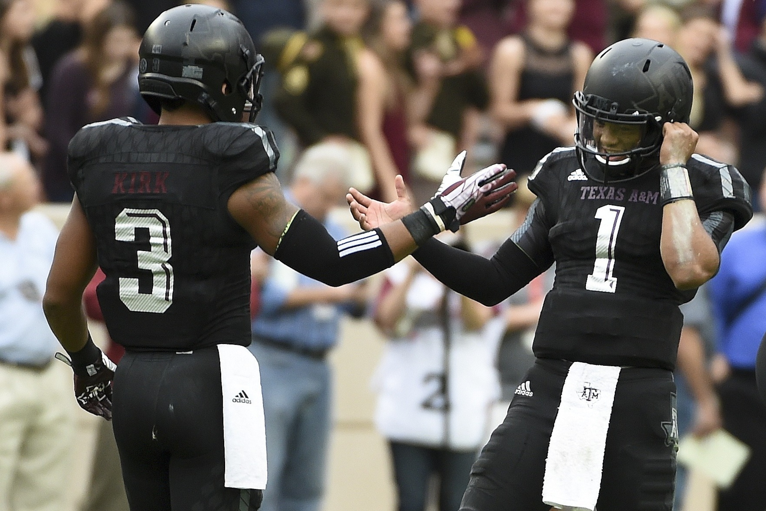 COLLEGE STATION, TX - OCTOBER 31: Kyler Murray #1 and Christian Kirk #3 of the Texas A&M Aggies celebrate the Aggies' 35-28 victory over the South Carolina Gamecocks in a NCAA football game at Kyle Field on October 31, 2015 in College Station, Texas. (Pho COLLEGE STATION, TX - OCTOBER 31: Kyler Murray #1 and Christian Kirk #3 of the Texas A&M Aggies celebrate the Aggies' 35-28 victory over the South Carolina Gamecocks in a NCAA football game at Kyle Field on October 31, 2015 in College Station, Texas. (Pho