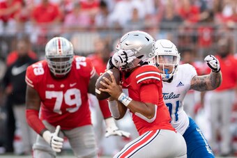 COLUMBUS, OHIO - SEPTEMBER 18: Quarterback C.J. Stroud #7 of the Ohio State Buckeyes is sacked by defensive lineman Cullen Wick #91 of the Tulsa Golden Hurricane during the third quarter at Ohio Stadium on September 18, 2021 in Columbus, Ohio. (Photo by G