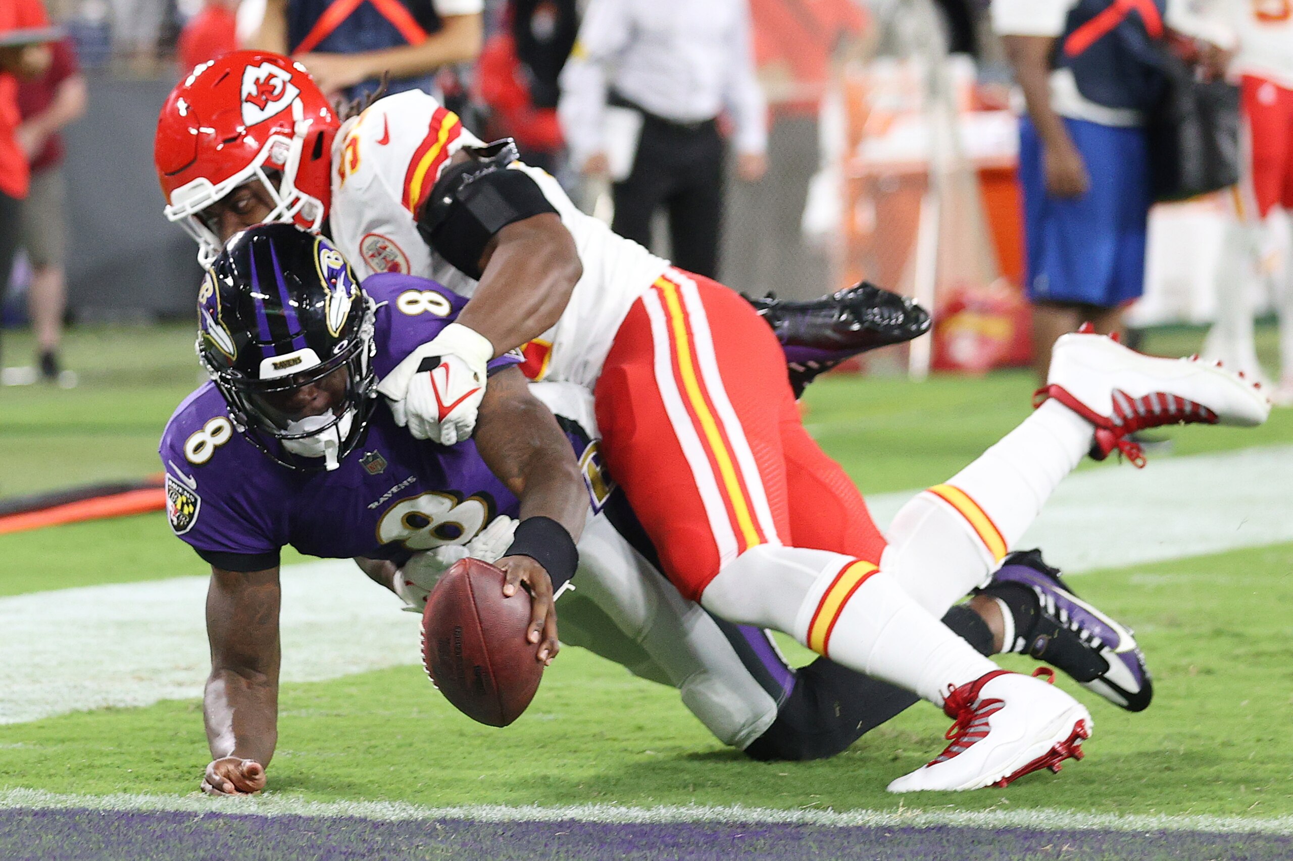 BALTIMORE, MARYLAND - SEPTEMBER 19: Lamar Jackson #8 of the Baltimore Ravens dives into the endzone past the tackle of Michael Danna #51 of the Kansas City Chiefs during the fourth quarter at M&T Bank Stadium on September 19, 2021 in Baltimore, Maryland. BALTIMORE, MARYLAND - SEPTEMBER 19: Lamar Jackson #8 of the Baltimore Ravens dives into the endzone past the tackle of Michael Danna #51 of the Kansas City Chiefs during the fourth quarter at M&T Bank Stadium on September 19, 2021 in Baltimore, Maryland.