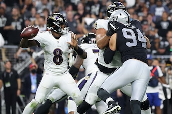 LAS VEGAS, NEVADA - SEPTEMBER 13: Quarterback Lamar Jackson #8 of the Baltimore Ravens drops back to pass during the NFL game against the Las Vegas Raiders at Allegiant Stadium on September 13, 2021 in Las Vegas, Nevada. The Raiders defeated the Ravens 33