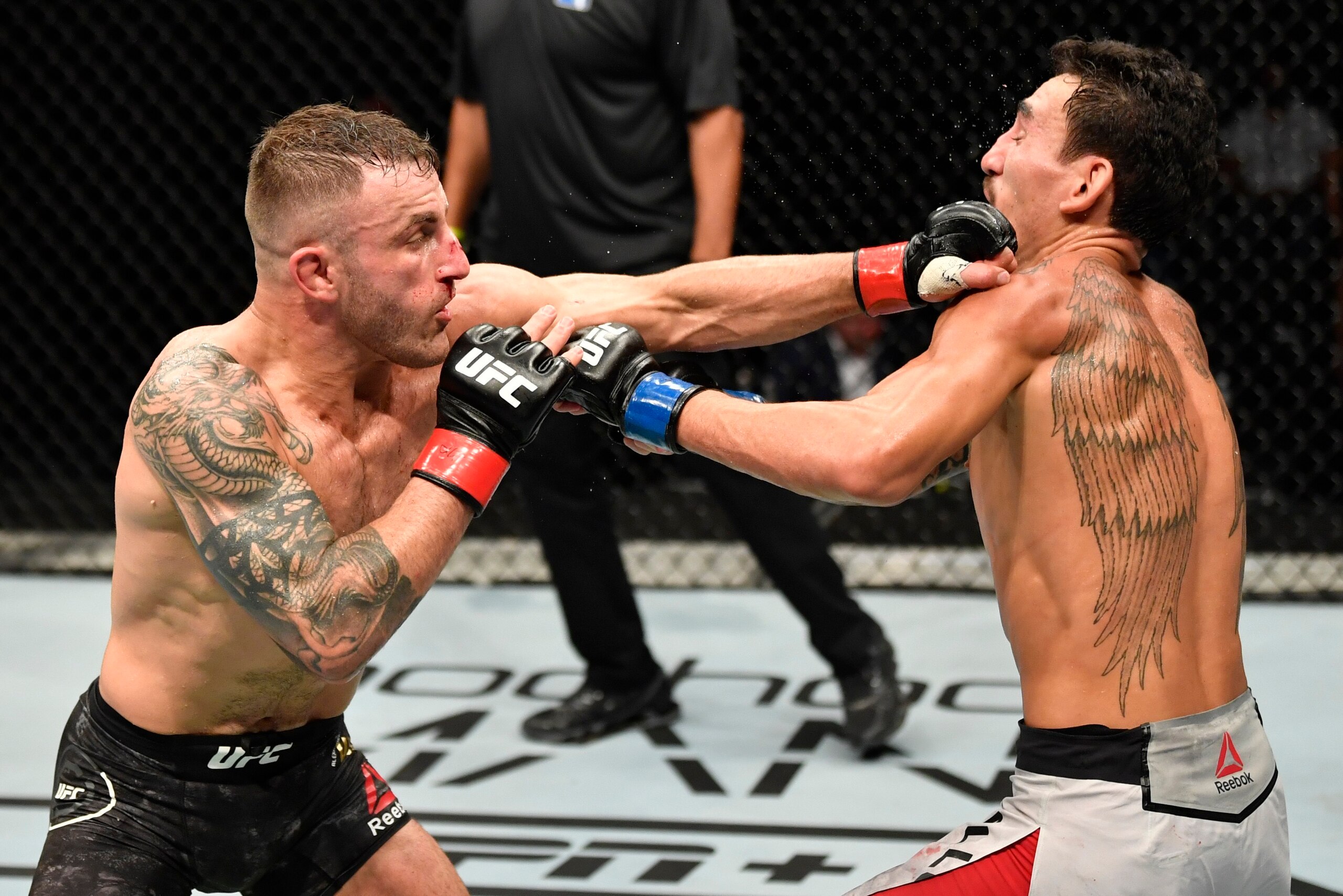 Volkanovski hits Max Holloway during their second fight in 2020