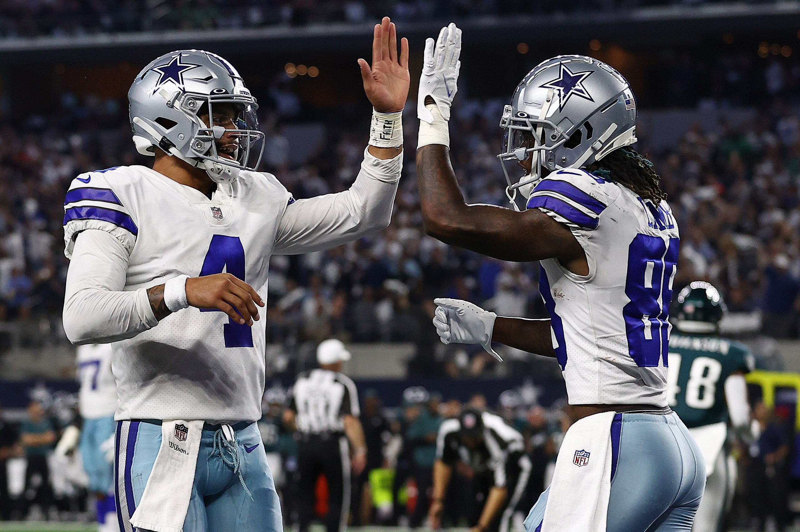 ARLINGTON, TEXAS - SEPTEMBER 27: CeeDee Lamb #88 of the Dallas Cowboys celebrates his second half touchdown with Dak Prescott #4 while playing the Philadelphia Eagles at AT&T Stadium on September 27, 2021 in Arlington, Texas. (Photo by Tom Pennington/Gett ARLINGTON, TEXAS - SEPTEMBER 27: CeeDee Lamb #88 of the Dallas Cowboys celebrates his second half touchdown with Dak Prescott #4 while playing the Philadelphia Eagles at AT&T Stadium on September 27, 2021 in Arlington, Texas. (Photo by Tom Pennington/Gett