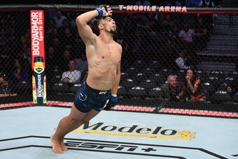 LAS VEGAS, NV - MARCH 02:  Johnny Walker of Brazil celebrates his victory over Misha Cirkunov of Latvia in their light heavyweight bout during the UFC 235 event at T-Mobile Arena on March 2, 2019 in Las Vegas, Nevada.  (Photo by Jeff Bottari/Zuffa LLC/Zuf