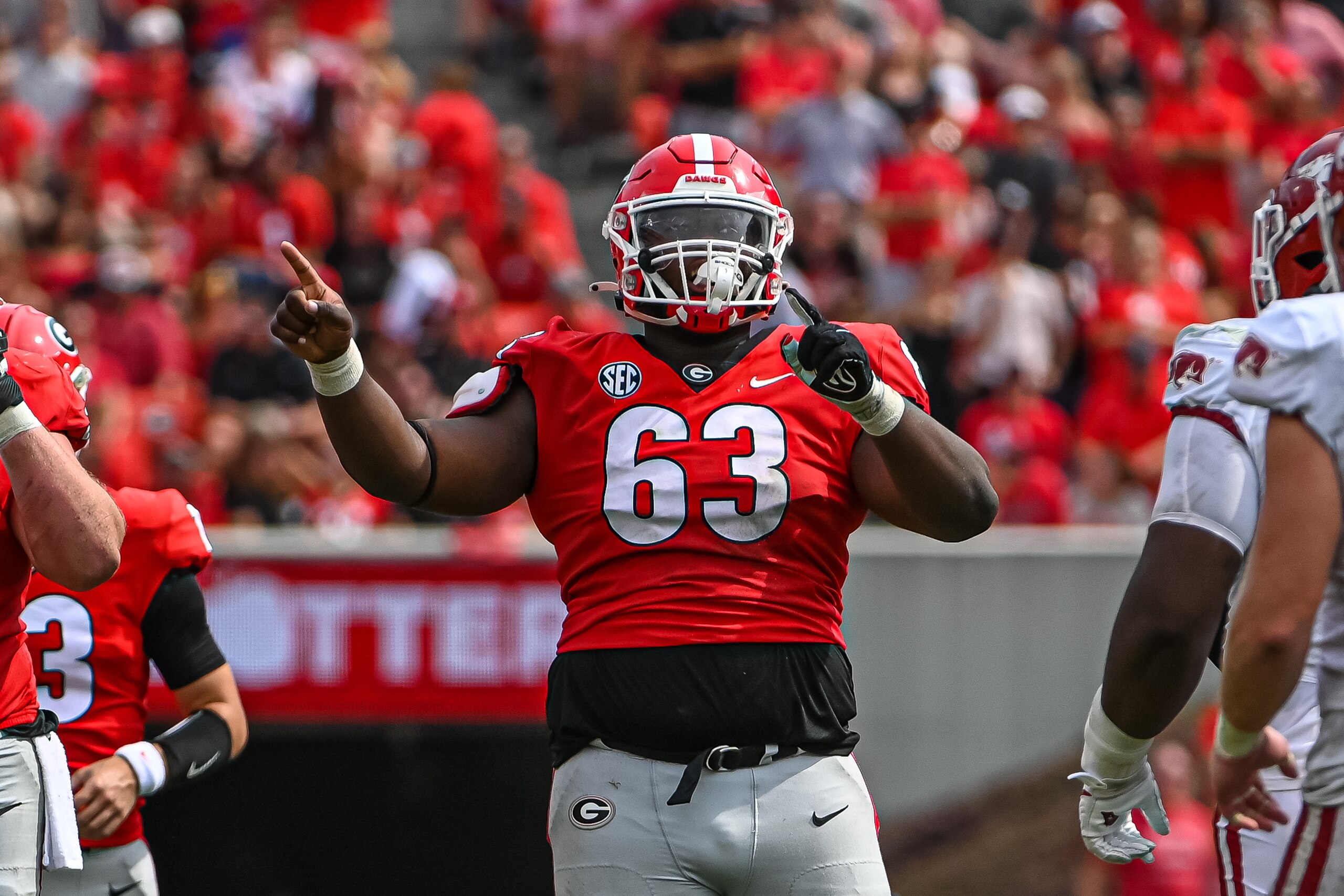 ATHENS, GA - OCTOBER 02: Georgia Bulldogs offensive lineman Sedrick Van Pran (63) during the NCAA football game between the Arkansas Razorbacks and Georgia Bulldogs on October 2, 2021 at Sanford Stadium in Athens, GA. (Photo by John Adams/Icon Sportswire ATHENS, GA - OCTOBER 02: Georgia Bulldogs offensive lineman Sedrick Van Pran (63) during the NCAA football game between the Arkansas Razorbacks and Georgia Bulldogs on October 2, 2021 at Sanford Stadium in Athens, GA. (Photo by John Adams/Icon Sportswire