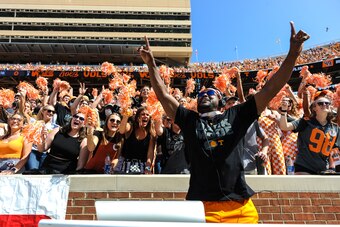 KNOXVILLE, TN - OCTOBER 09: Tennessee Volunteers fans and DJ Sterl the Pearl celebrate during the game against the South Carolina Gamecocks on October 9, 2021, at Neyland Stadium in Knoxville, TN. (Photo by Bryan Lynn/Icon Sportswire via Getty Images)