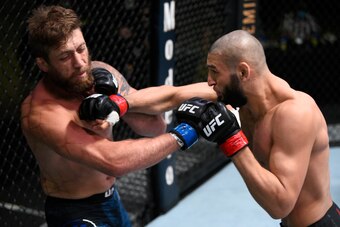 LAS VEGAS, NEVADA - SEPTEMBER 19: In this handout image provided by UFC, (R-L) Khamzat Chimaev of Chechnya punches Gerald Meerschaert in their middleweight bout during the UFC Fight Night event at UFC APEX on September 19, 2020 in Las Vegas, Nevada. (Phot