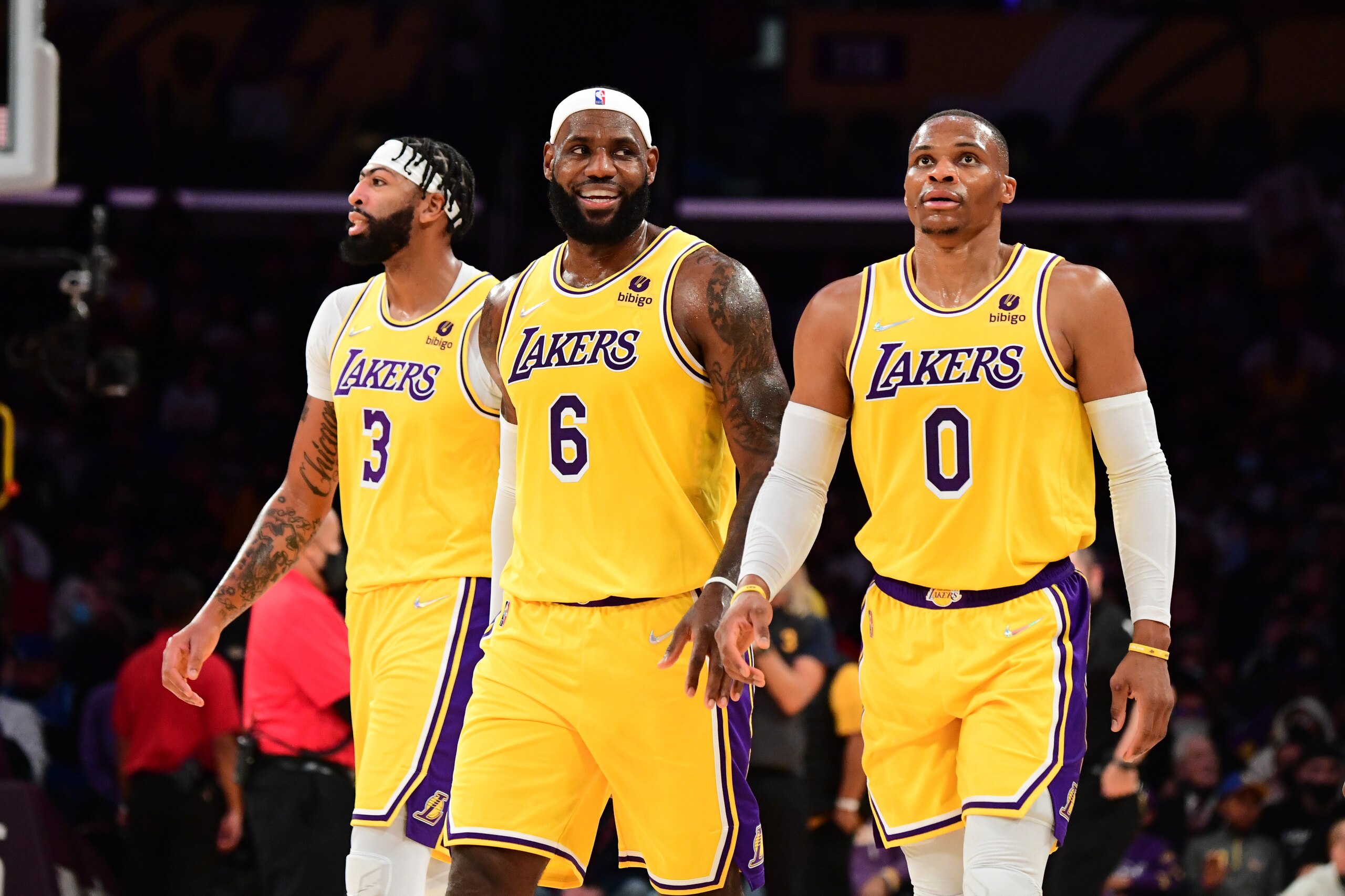 LOS ANGELES, CA - OCTOBER 12: Anthony Davis #3, LeBron James #6 and Russell Westbrook #0 of the Los Angeles Lakers look on during a preseason game against the Golden State Warriors on October 12, 2021 at STAPLES Center in Los Angeles, California. NOTE TO 